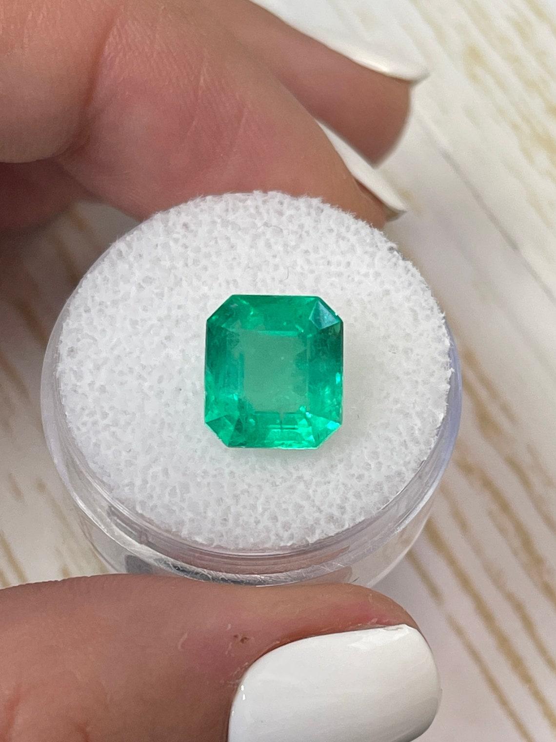 Stone: Emerald
Weight: 4.21-carats
Shape: Emerald Cut
Clarity: Transparent
Luster: Very Good
Color: Yellowish Green
Measurements: 10.28mm x 9.32mm x 6.90mm
Geographic Origin: Colombia
Treatment: Natural, Oiling

Comments: Due to their growth
