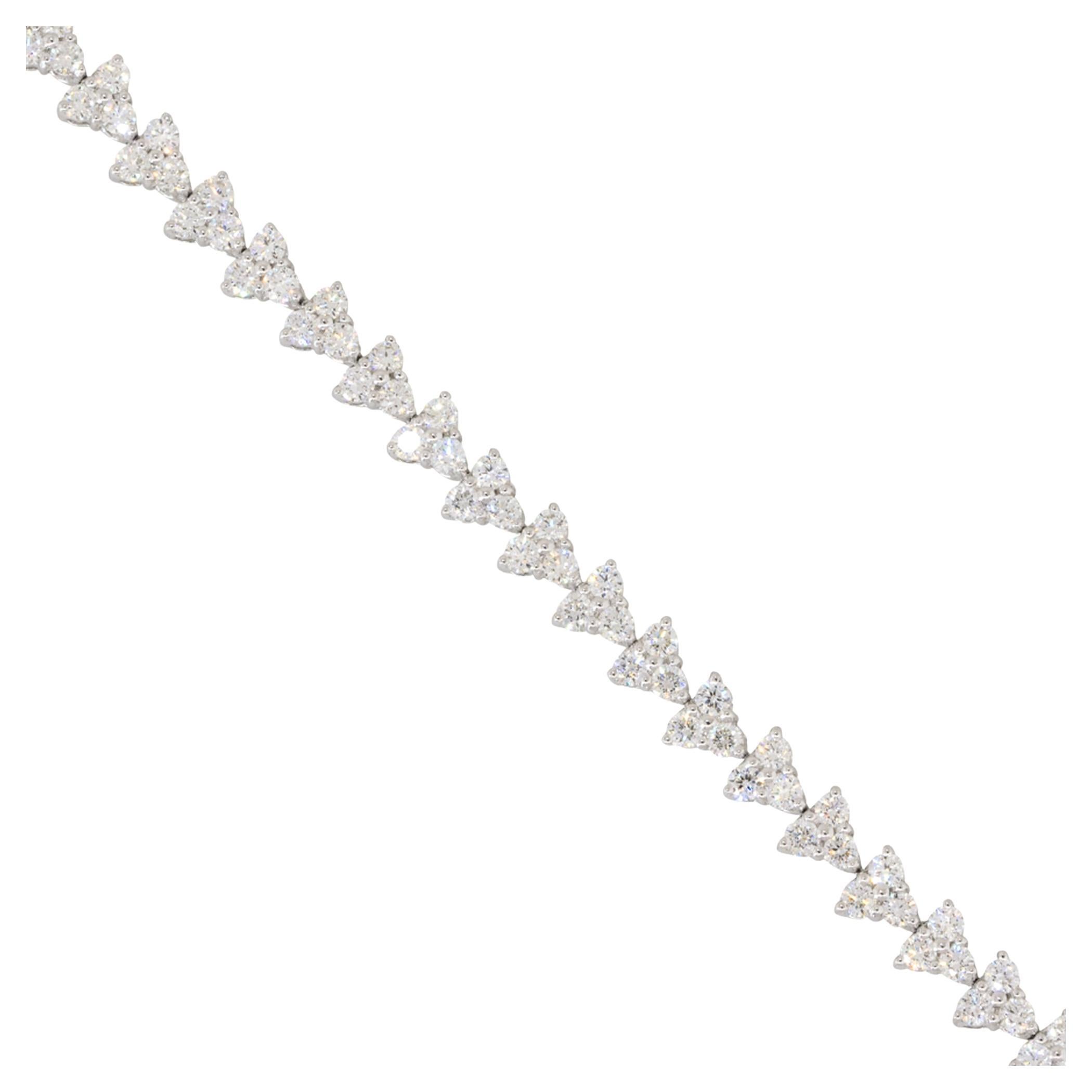Bracciale tennis con tre pietre e diamanti da 4,21 carati 18 carati in stock