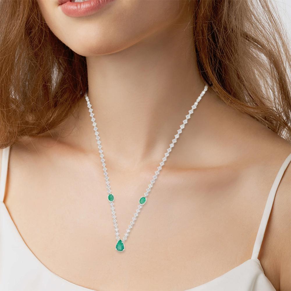 Cast from 14-karat gold, this exquisite necklace is hand set with 4.21 carats Emerald and 4.80 carats of sparkling diamonds. 

FOLLOW MEGHNA JEWELS storefront to view the latest collection & exclusive pieces. Meghna Jewels is proudly rated as a Top