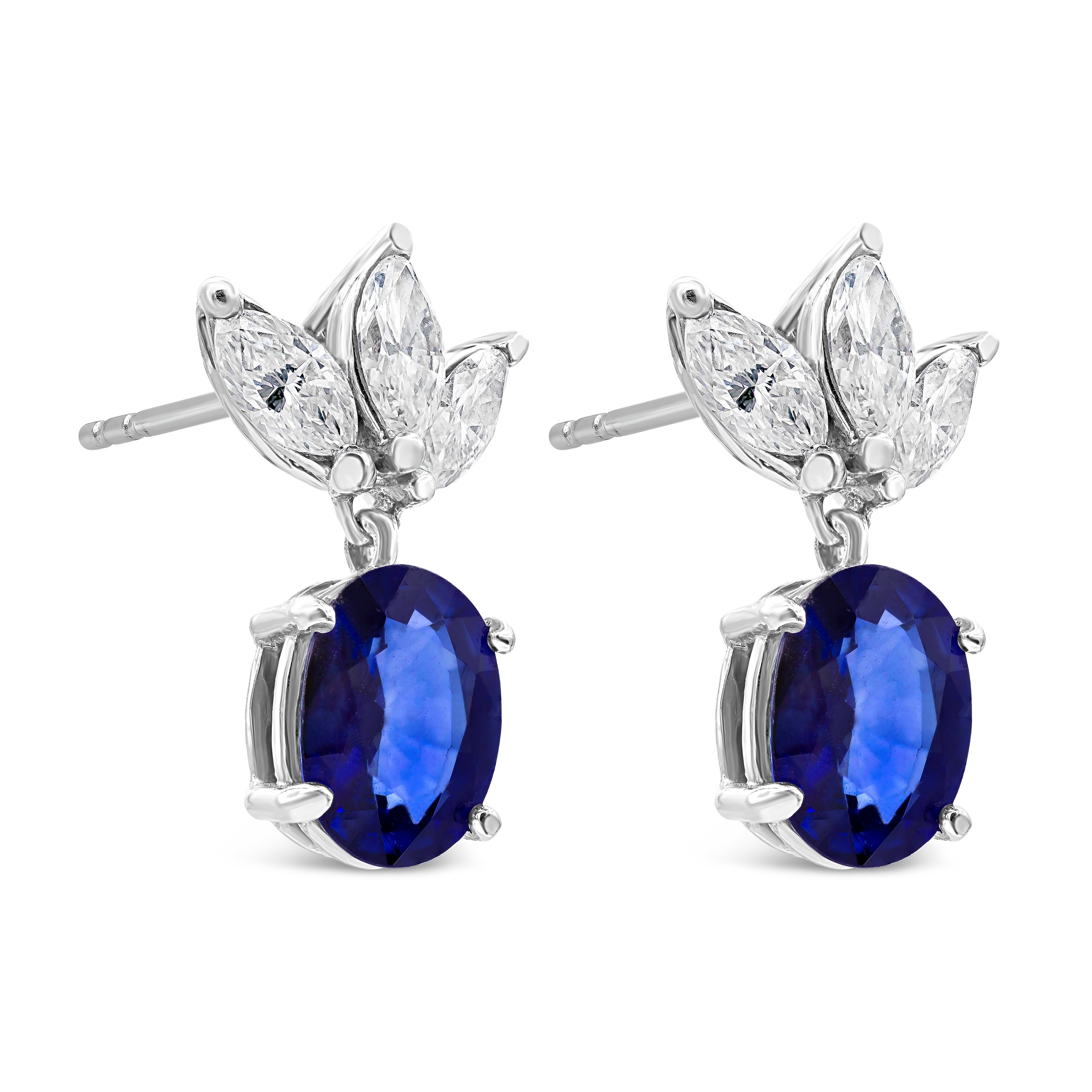 Contemporary 4.21 Carats Total Oval Cut Blue Sapphire & Diamond Dangle Earrings For Sale