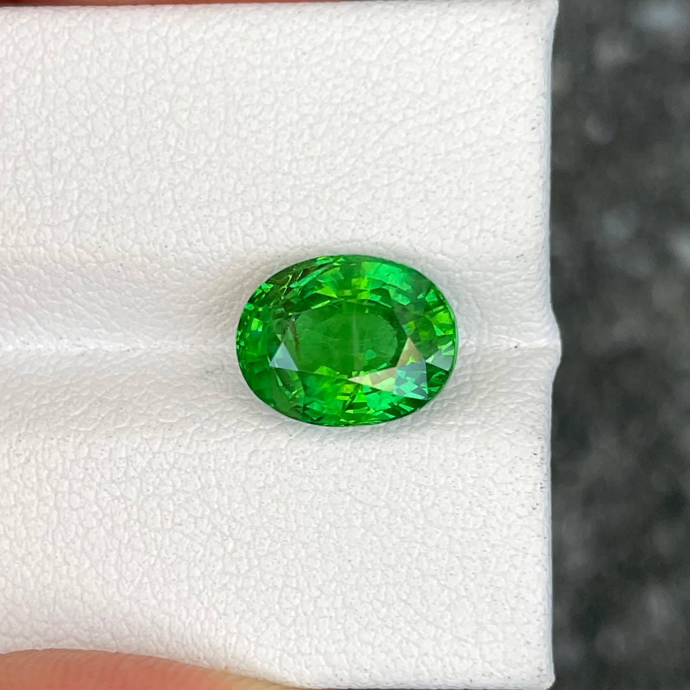 Women's or Men's 4.21 carats Vivid Green Tsavorite Garnet Stone Oval Cut Tanzanian Gemstone For Sale