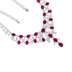 42.19 Carat Oval Ruby 27.96 Carat SI/H Pear Diamond 14 Karat White Gold Necklace