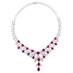 42.19 Carat Oval Ruby 27.96 Carat SI/H Pear Diamond 14 Karat White Gold Necklace