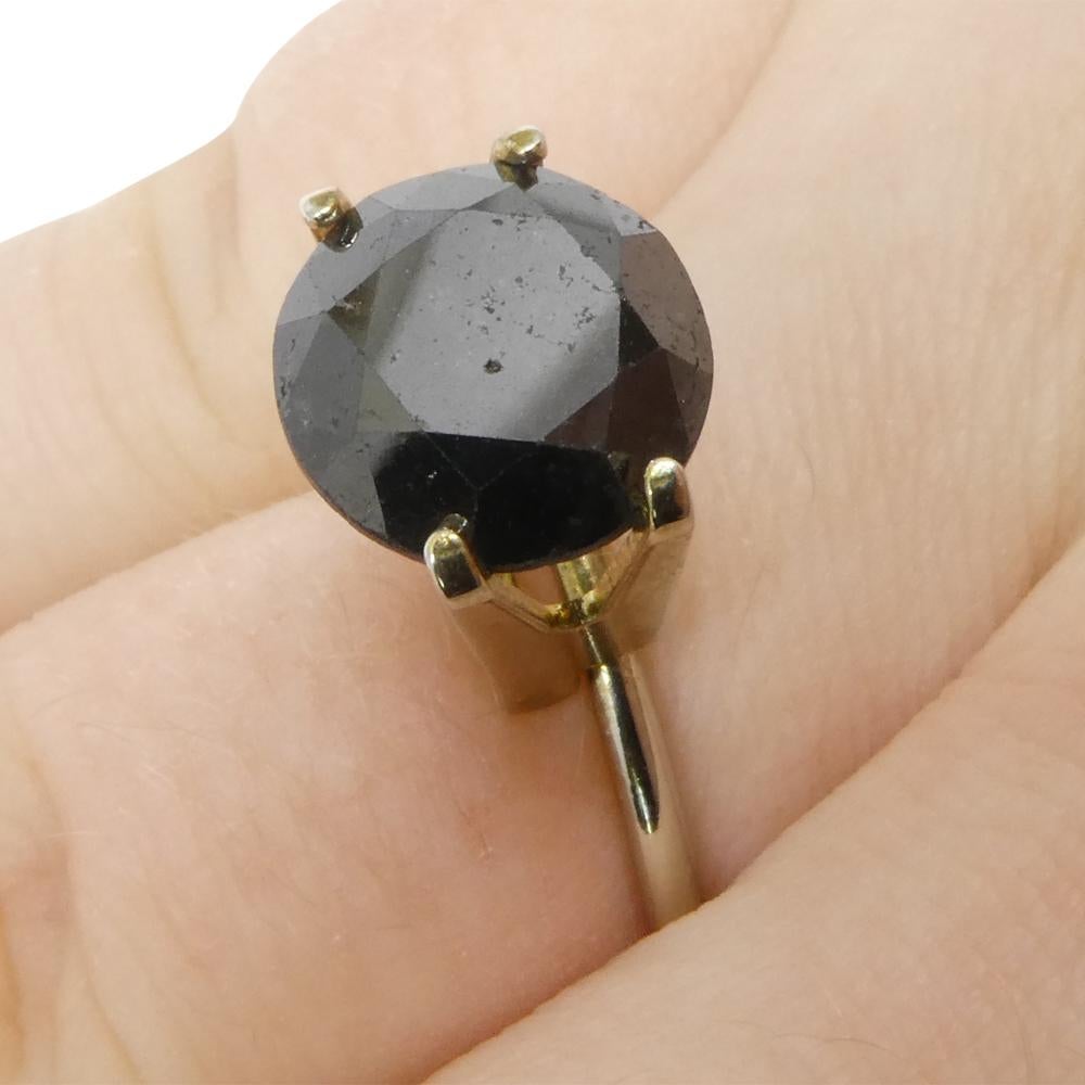 Description:

Gem Type: Diamond 
Number of Stones: 1
Weight: 4.21 cts
Measurements: 9.78 x 9.78 x 6.68 mm
Shape: Round
Cutting Style Crown: Brilliant Cut
Cutting Style Pavilion: Brilliant Cut 
Transparency: Opaque
Clarity: N/A
Colour: Black
Hue: