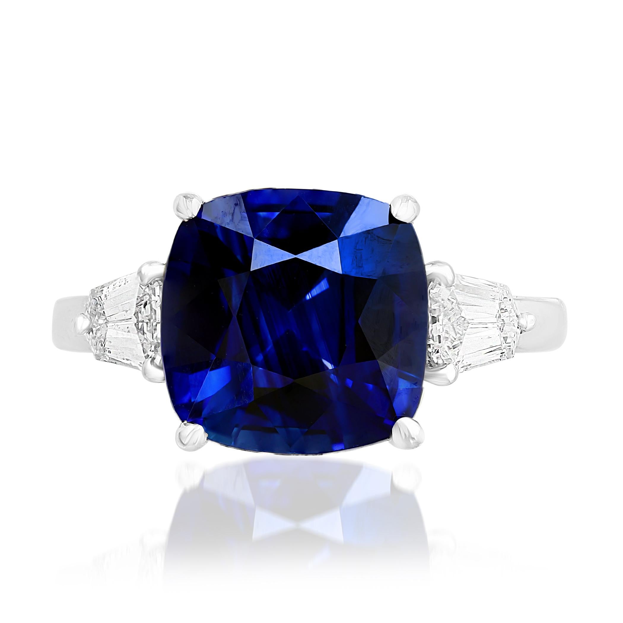 Features a gorgeous 4.22 carat cushion cut blue sapphire. Flanked by a bullet cut diamond side stone and each side weighing 0.54 carats total. Set in platinum.

Style available in different price ranges. Prices are based on your selection. Please
