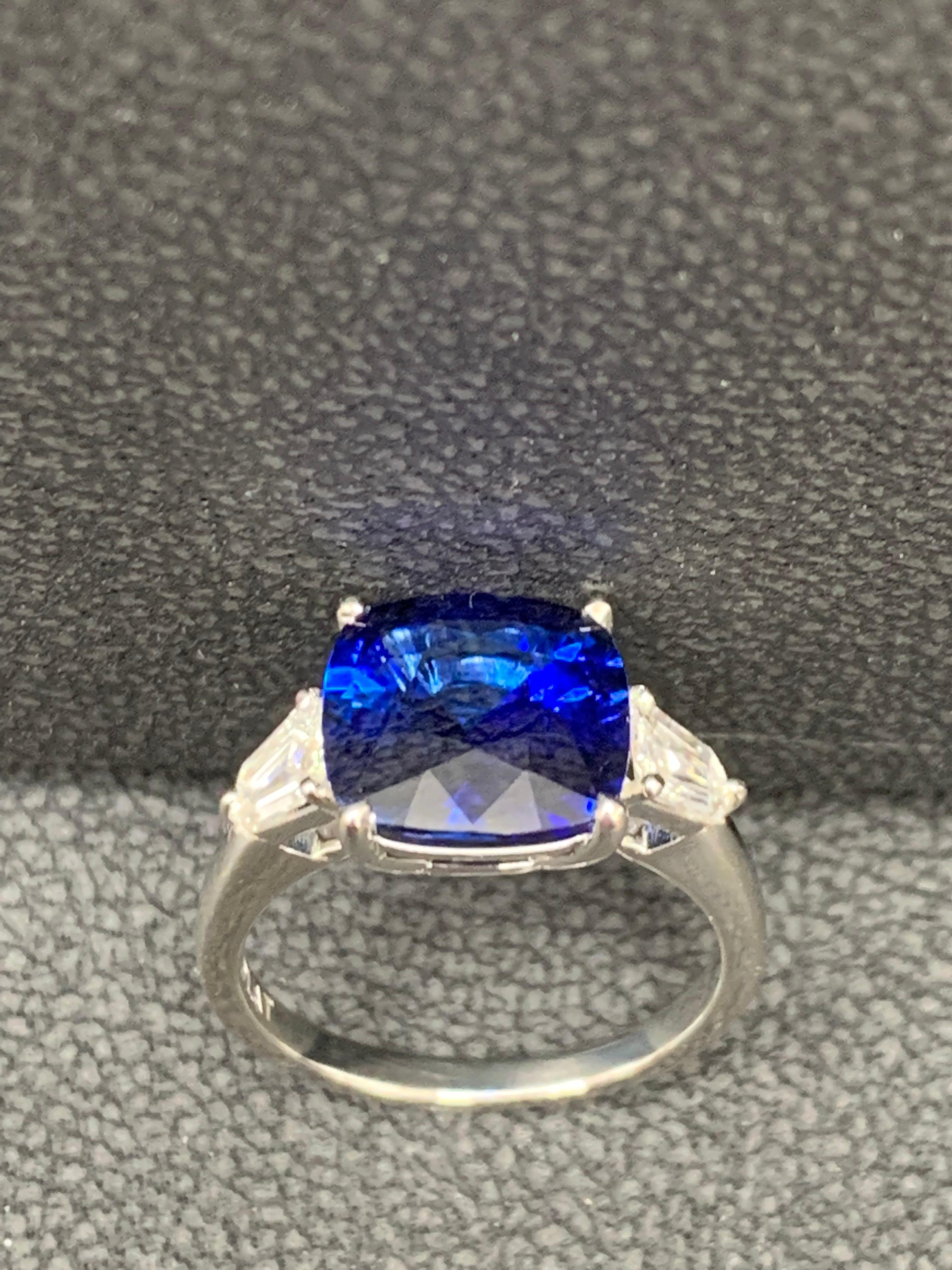 4.22 Carat Cushion Cut Blue Sapphire Diamond Three-Stone Ring in Platinum In New Condition For Sale In NEW YORK, NY