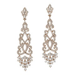 Boucles d'oreilles chandelier en or rose avec diamants pendants de 4,22 carats