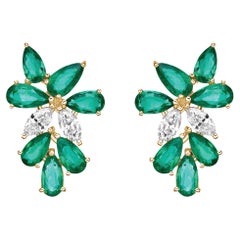 4.22 Carat Emerald Drop Earrings in 18Karat Yellow Gold with White Diamond.