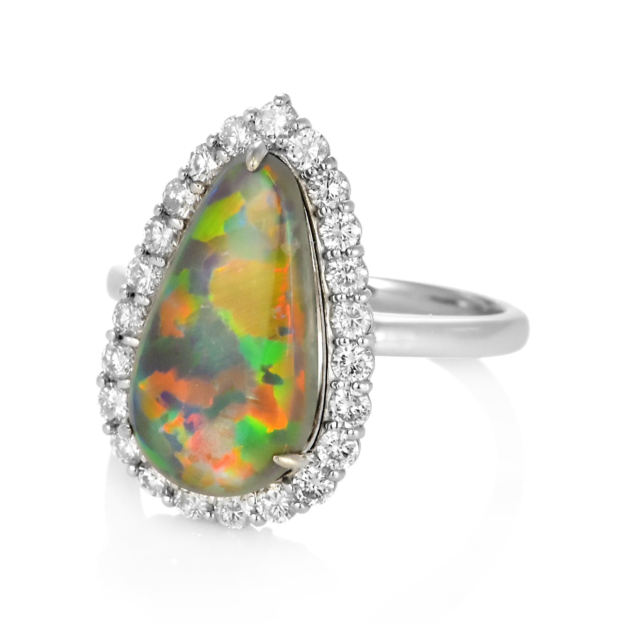 Modern 4.22 Carat Natural Australian Black Opal and Diamond Ring Made in Platinum For Sale