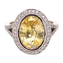Ring aus Platin mit 4,22 Karat ovalem, gelbem Brillant-Saphir und Diamant