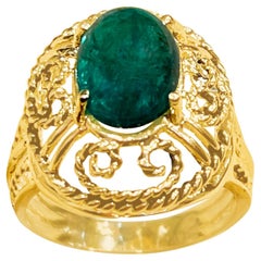 4.22 Carat Oval Emerald Cabochon 14 Karat Yellow Gold Cocktail Ring Vintage