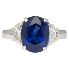 4.22 Carat Vivid Blue Oval Cut Sapphire & Diamond 3 Stone Ring