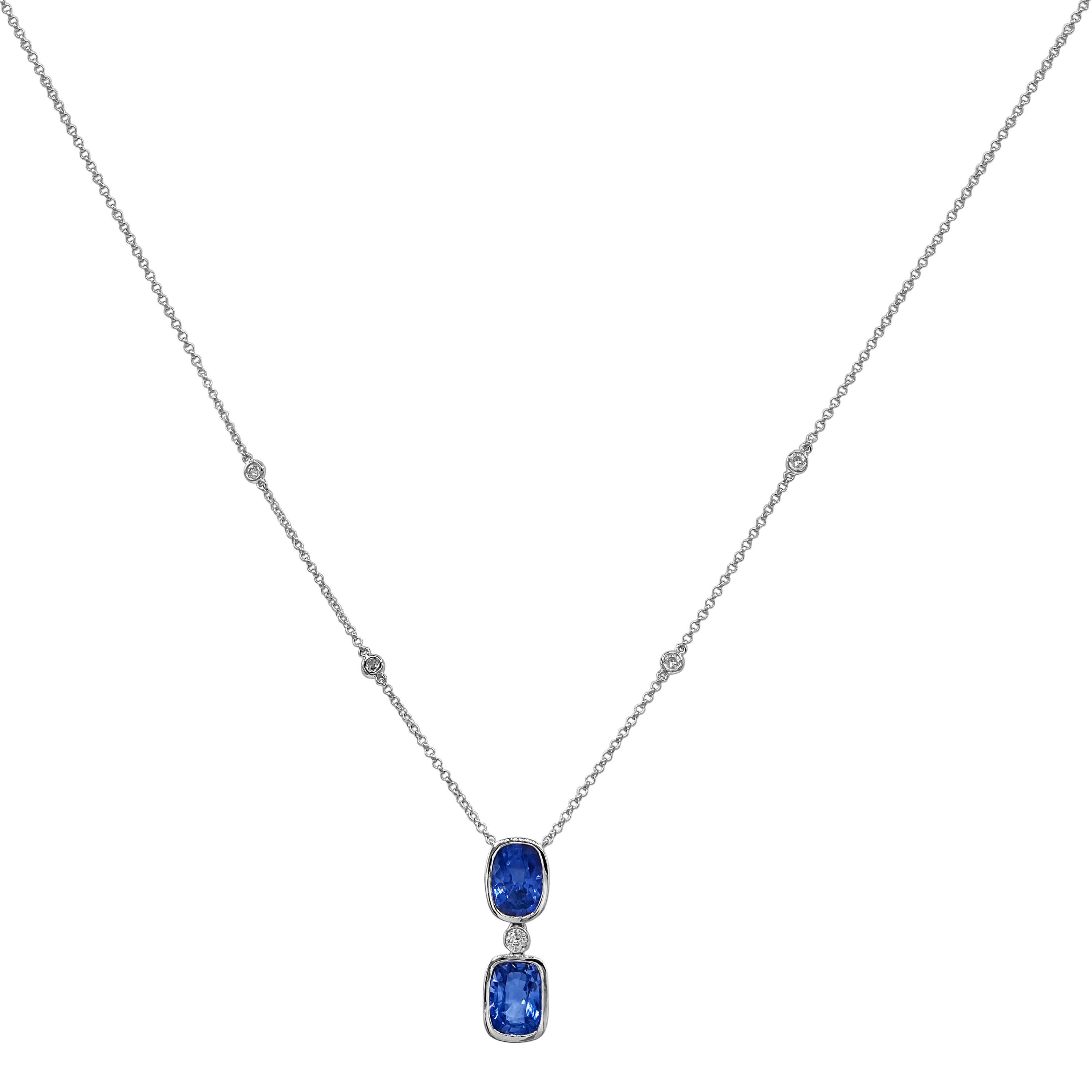 2 Sapphire Gemstones: 4.07 Carats
5 White Diamonds: 0.15 Carats
Metal: 18K White Gold, 3.80 Grams
