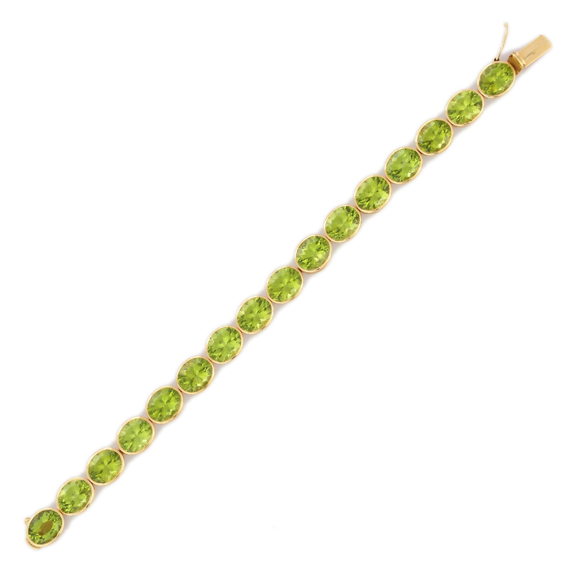 42.2 Karat Peridot-Tennisarmband aus 18 Karat Gelbgold (Art déco) im Angebot