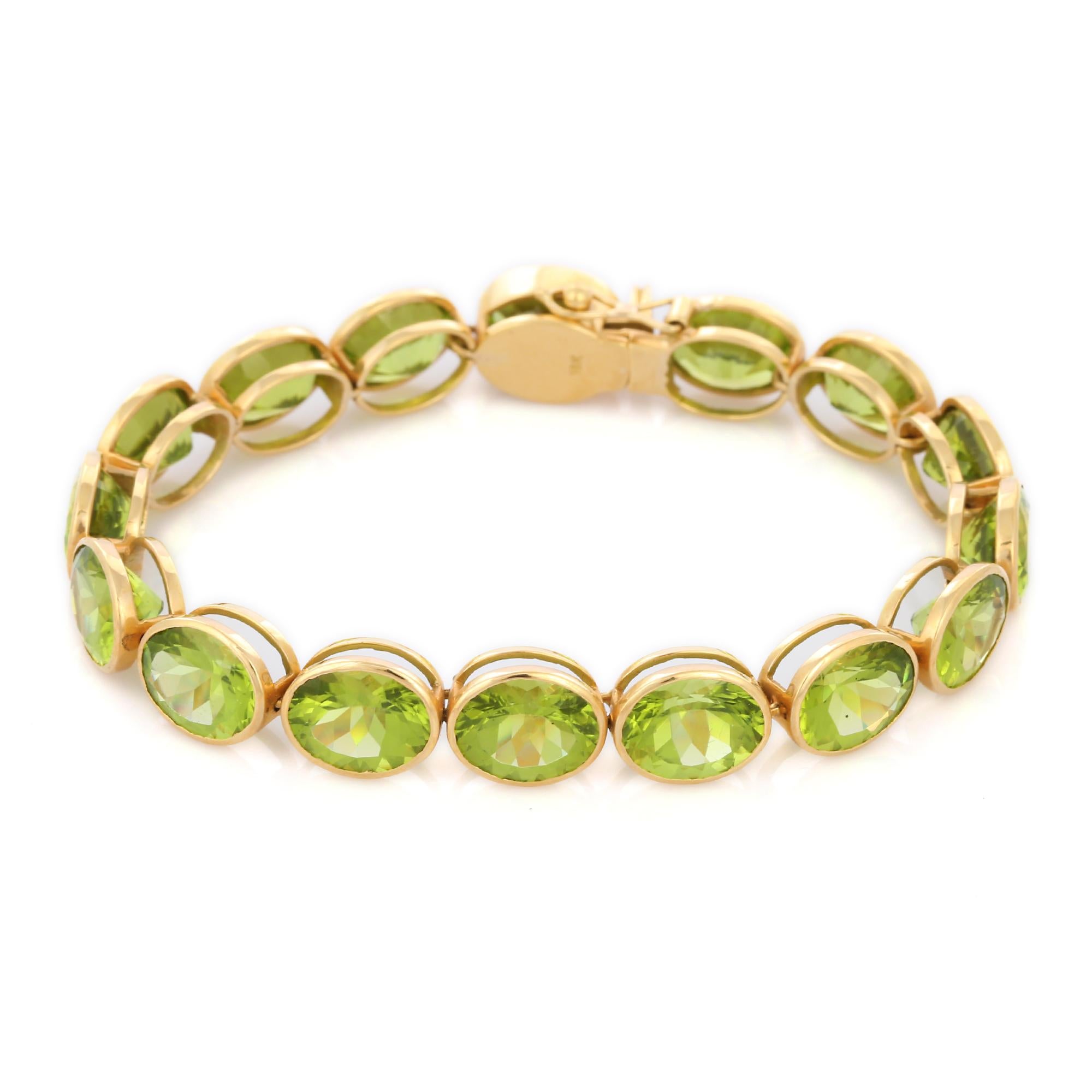 Art Deco 42.2 Ct Peridot Tennis Bracelet in 18K Yellow Gold For Sale