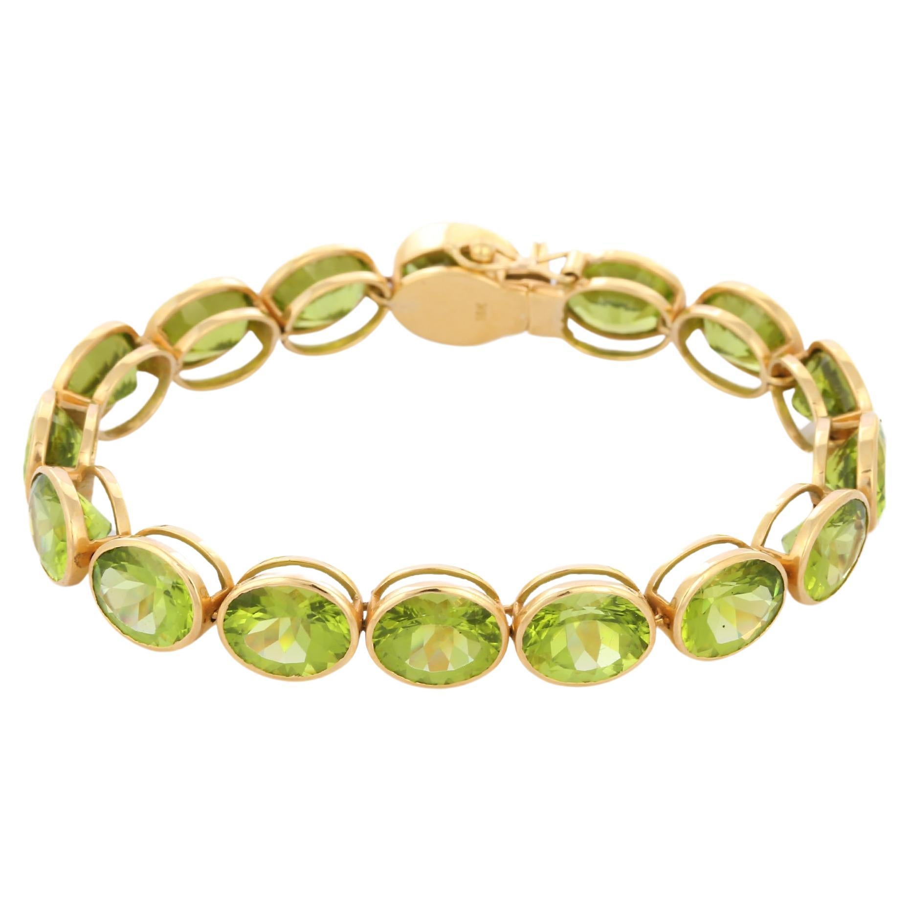 42.2 Ct Peridot Tennis Bracelet in 18K Yellow Gold For Sale