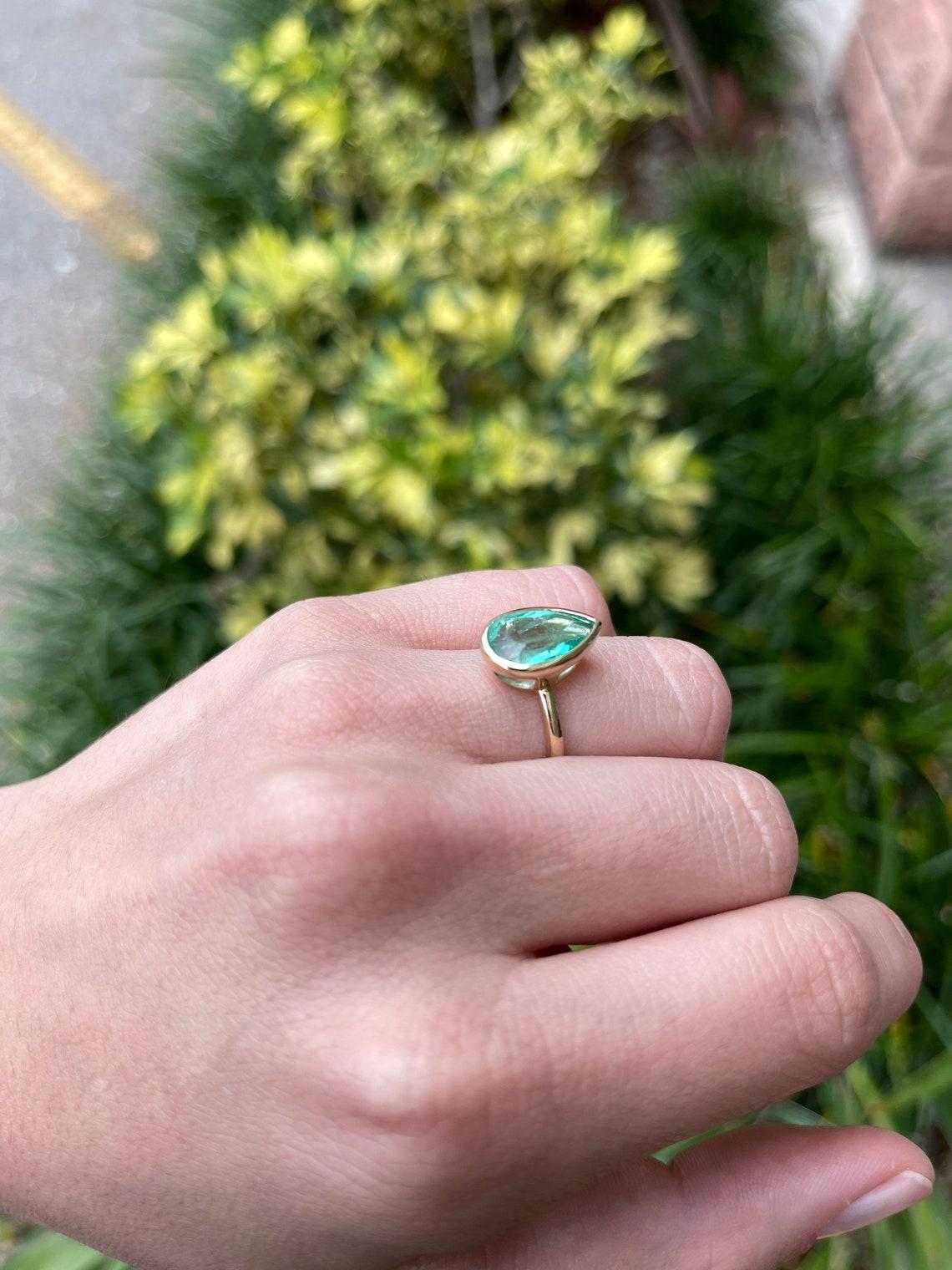 4.22ct 14K Colombian Emerald Pear Cut Bezel Solitaire Gold Ring In New Condition For Sale In Jupiter, FL