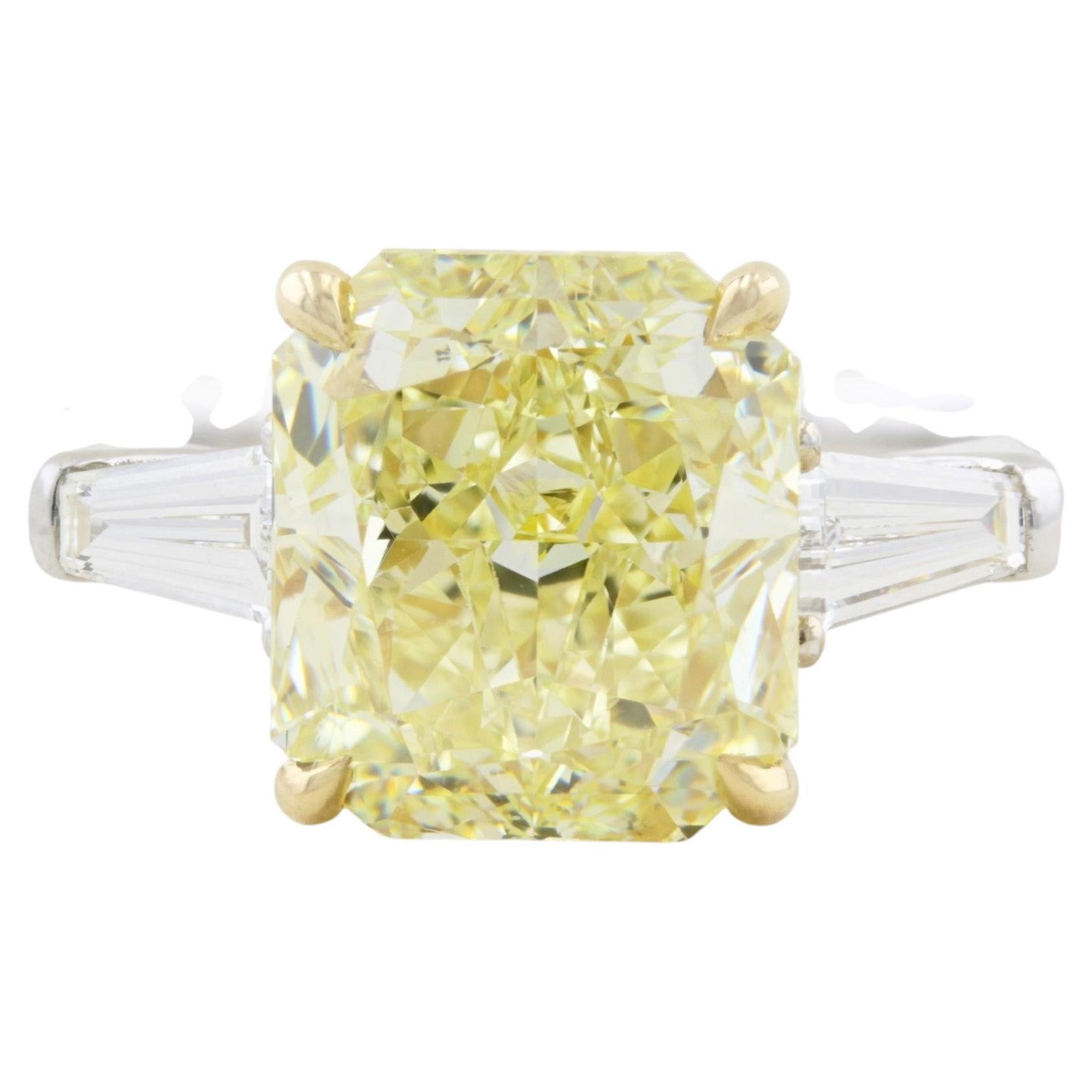 4.22ct Natural Fancy Yellow Diamond Three Stone Ring For Sale
