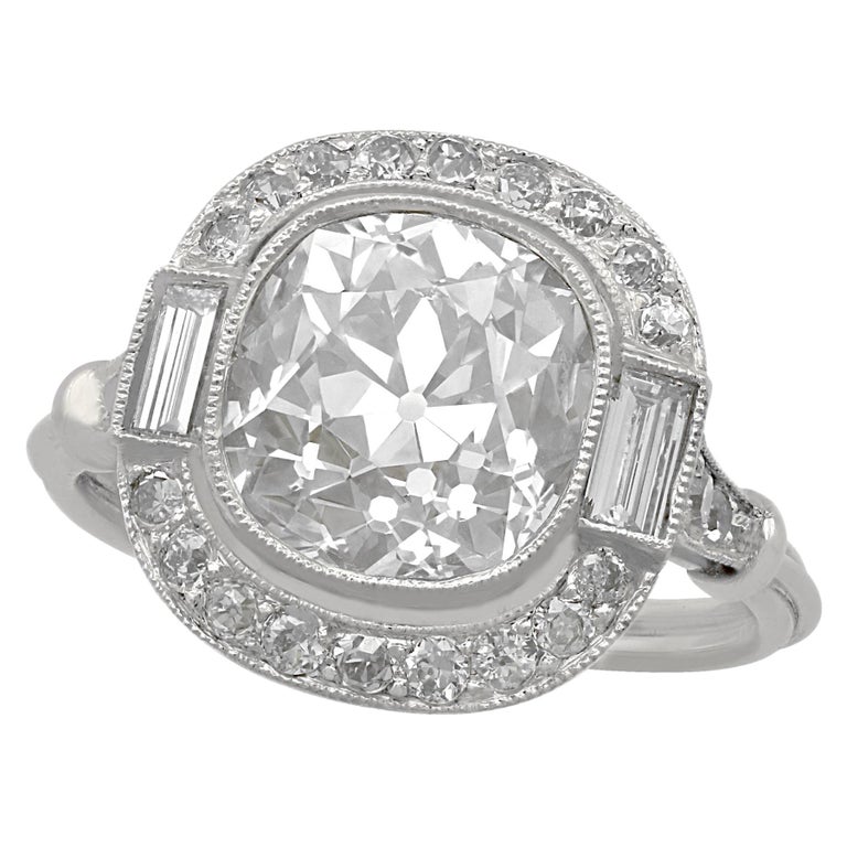 4.23 Carat Diamond and Platinum Halo Engagement Ring For Sale