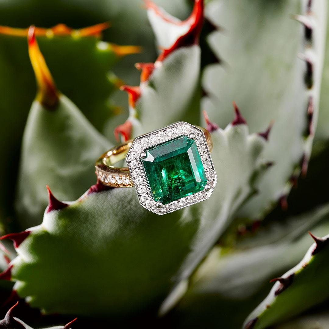 Art Deco 4.23 Carat Emerald White Diamonds 18 Carat White and Yellow Gold Ring For Sale