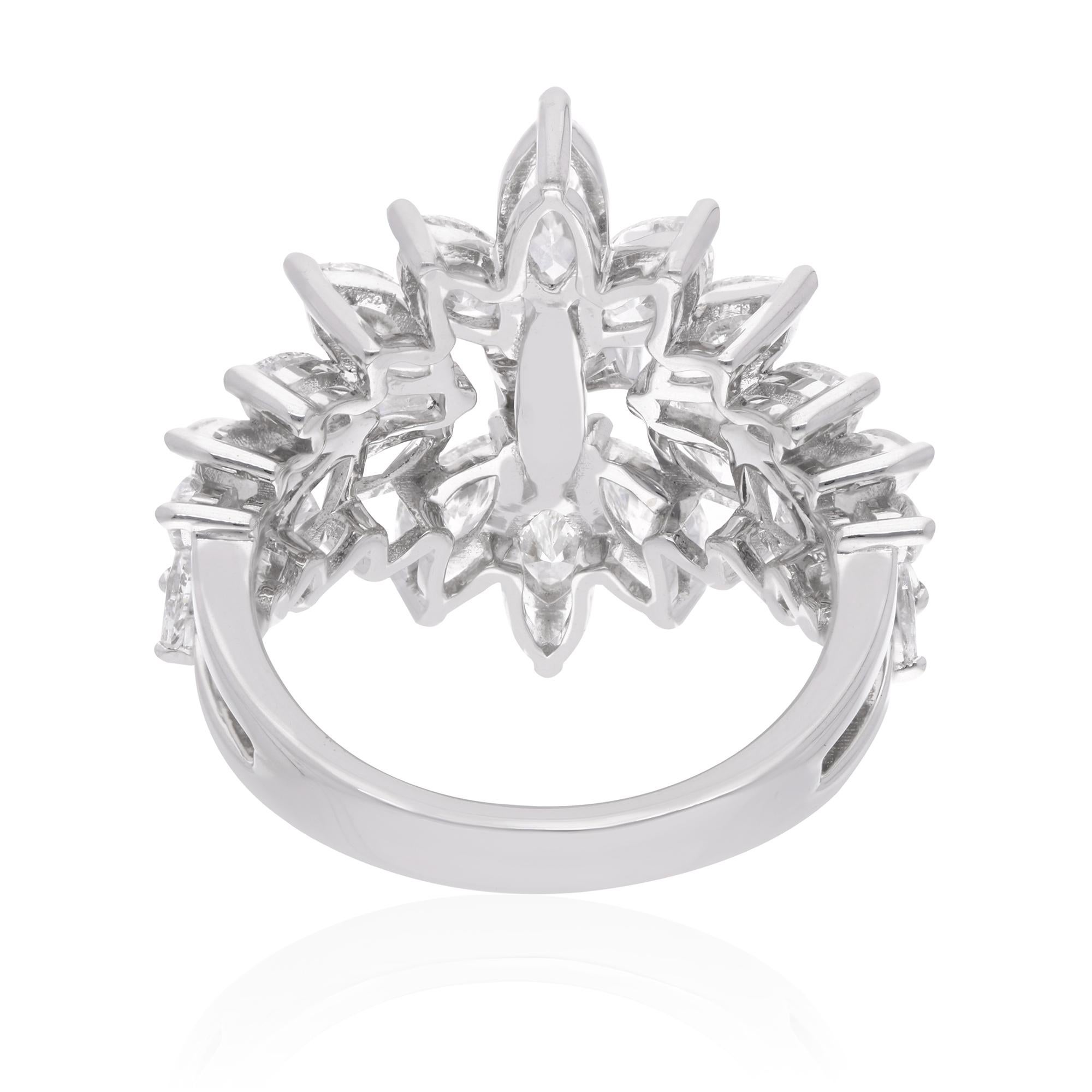 Every facet of this ring is designed to catch the light from every angle, creating a mesmerizing display of sparkle and radiance. The brilliance of the diamonds is further enhanced by the sleek and contemporary setting of 14 karat white gold, which