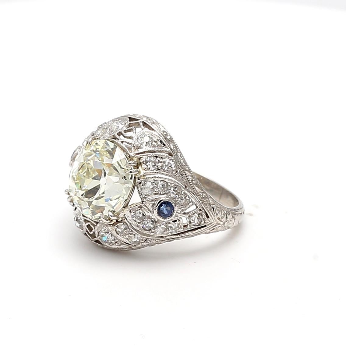 4.23 Carat Old European Cut Diamond 0.06 Carat Sapphire Platinum Art Deco Ring For Sale 9