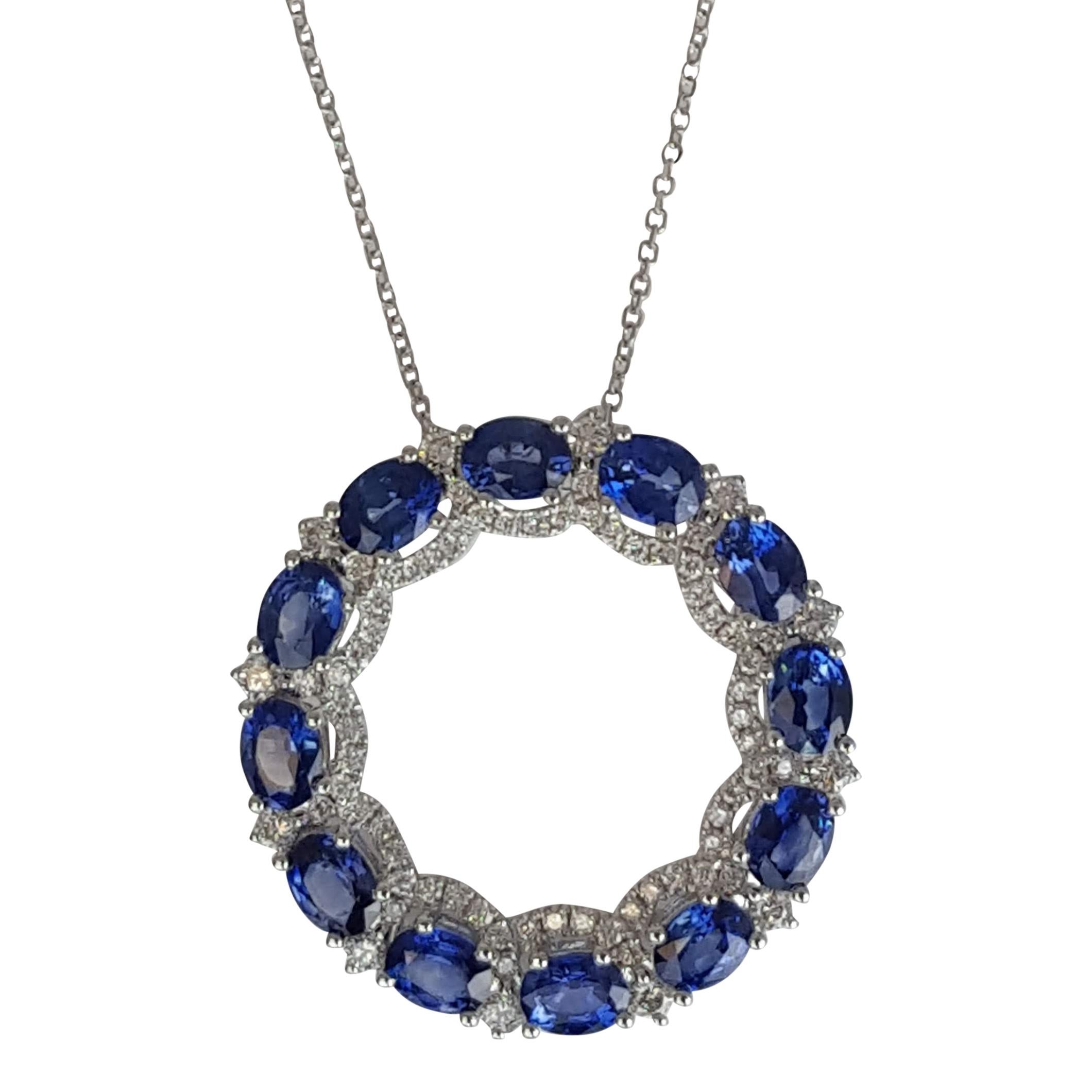 Contemporary 4.23 Carat Oval Cut Blue Sapphire and Round Diamond Pendant ref1781 For Sale
