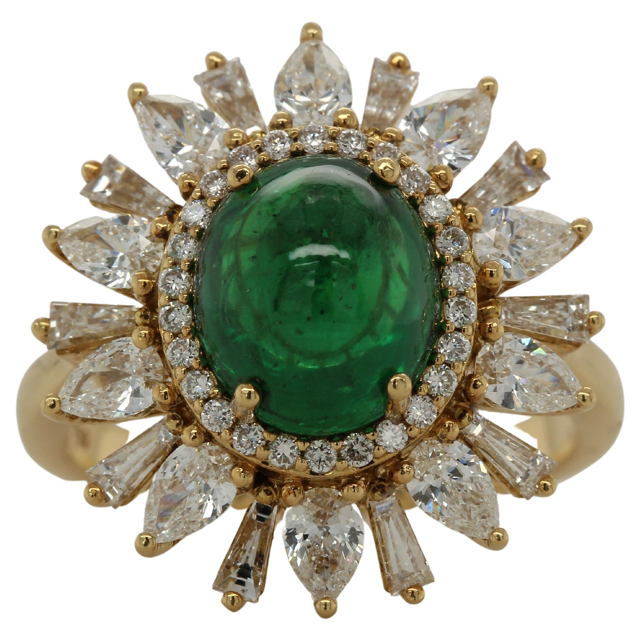 This mesmerizing 4.23 carat oval tsavorite and diamond ring is the perfect symbol of elegance and simplicity at its finest. The tsavorite is set with 0.16 carats of white round diamonds, white tapper 0.46 carats and white pear 1.04 carats, while a