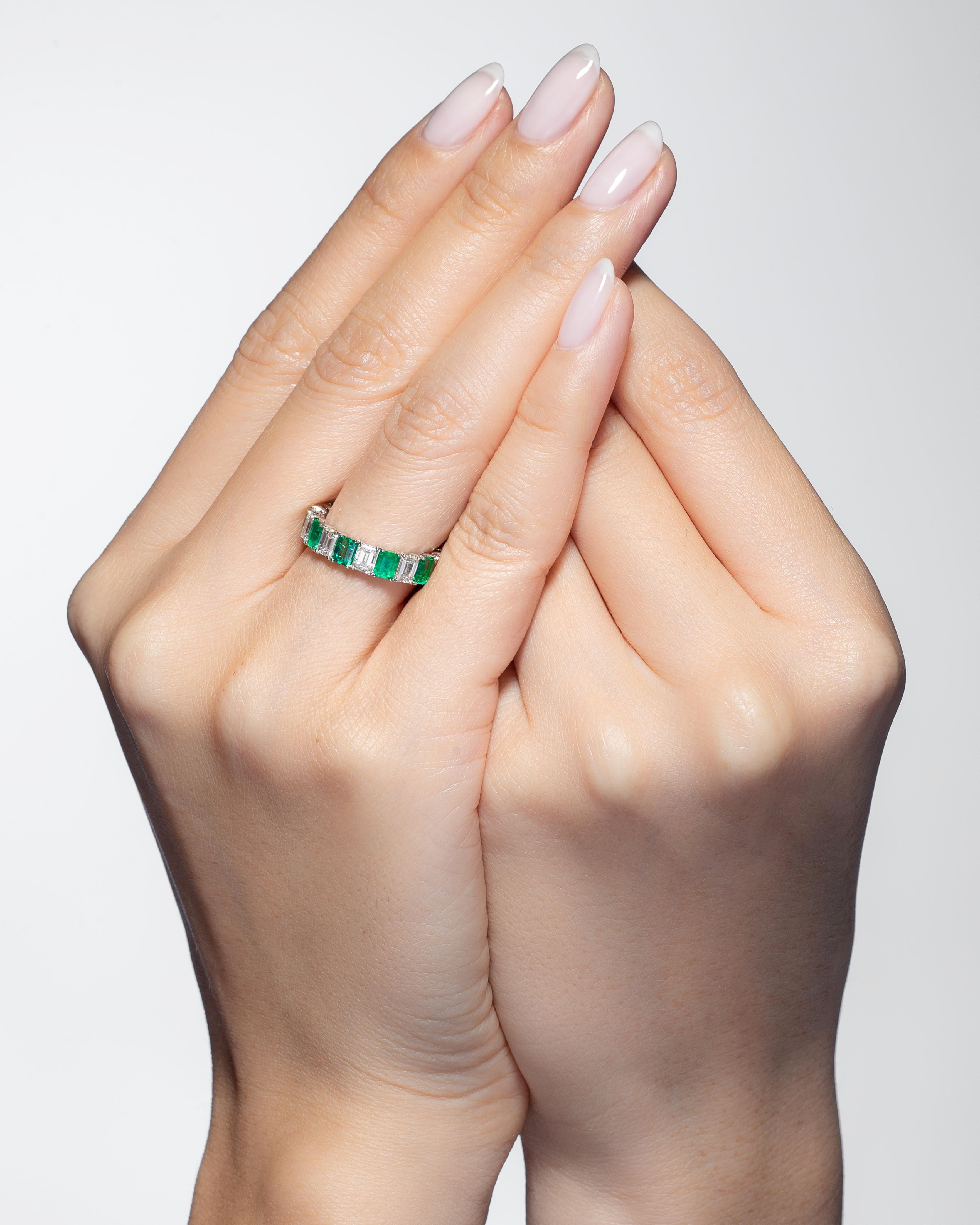 Emeralds are a true timeless classic. Their facets stand tall like an eternal hall of mirrors. This eternity band features 1.89 carats of Zambian green Emeralds and 2.34 carats of White Emerald Cut Diamonds. In total, the eternity band has 4.23