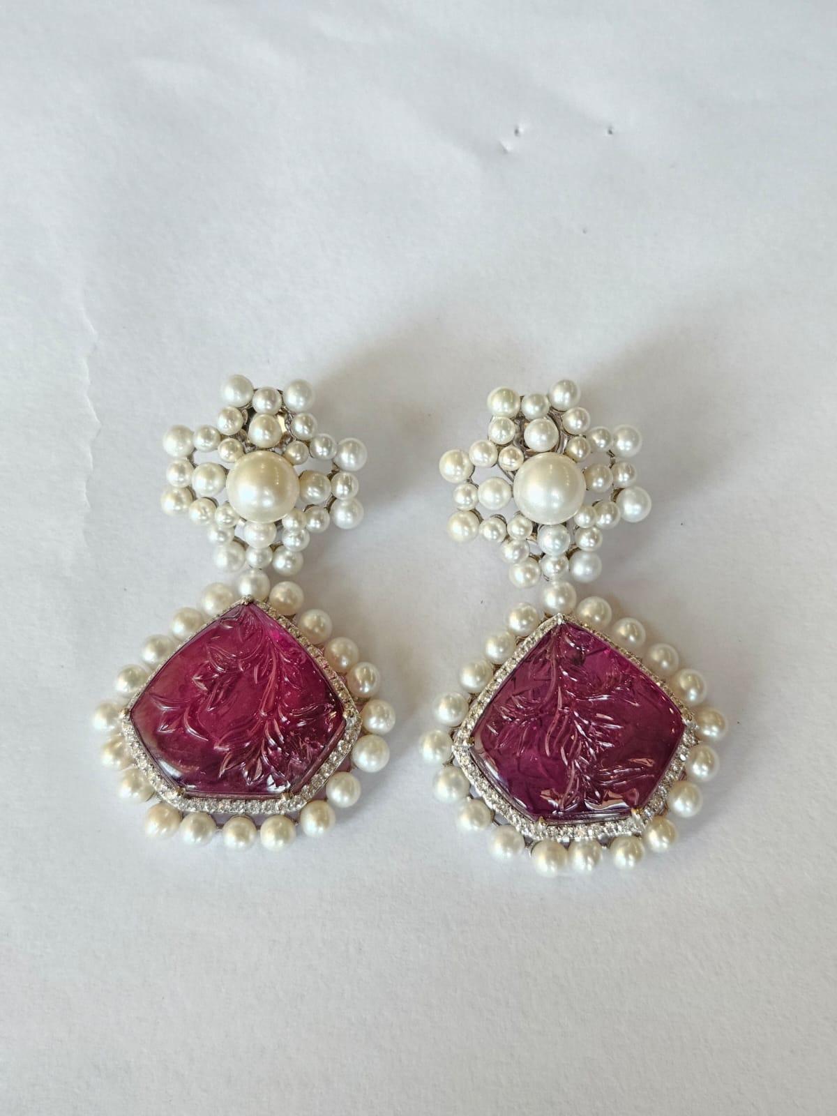  A very gorgeous and modern style, Tourmaline & Pearl Chandelier Earrings set in 18K White Gold & natural Diamonds. The weight of the carved Tourmaline is 42.31 carats. The Tourmalines are hand - carved in our very own workshop. The weight of the