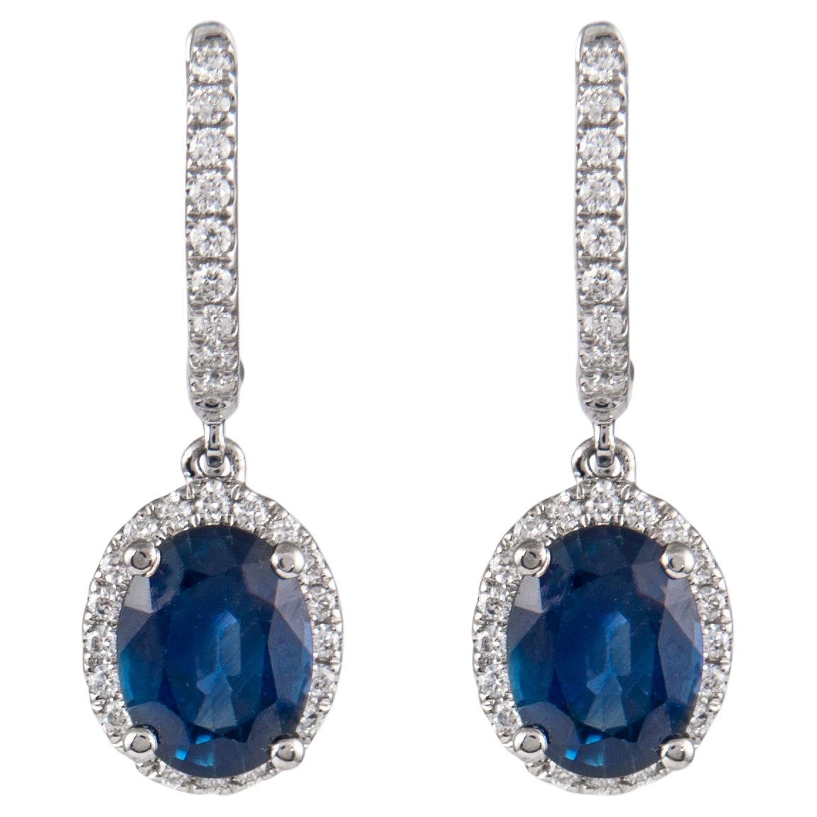 Orecchini a goccia con zaffiro ovale e diamante a forma di aureola, oro bianco 18 carati, 4,23ct