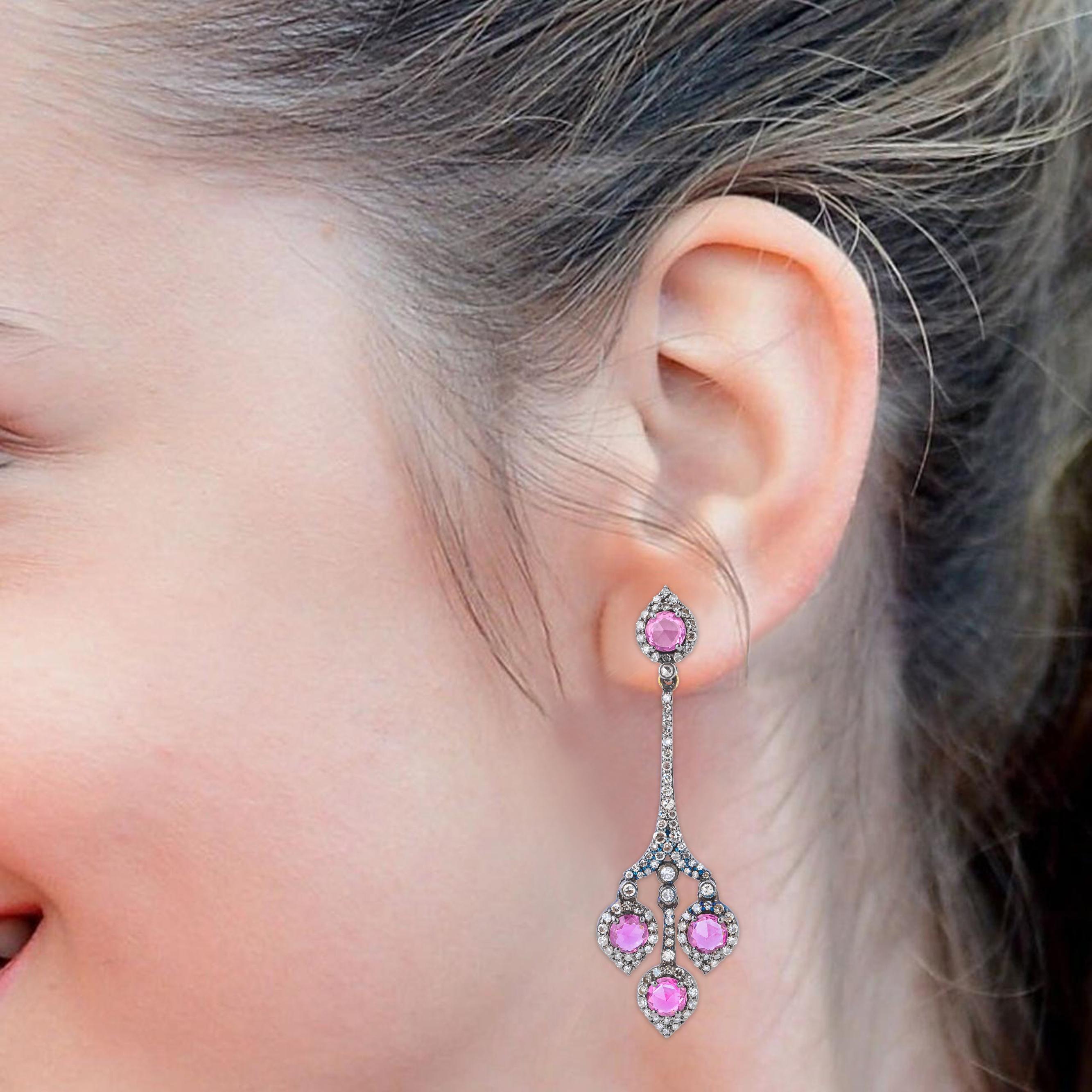 Immerse yourself in elegance with our 4.24 Carat Diamond and Pink Sapphire Drop Earrings, where exquisite craftsmanship meets the enchanting allure of precious gemstones. Each pair is meticulously curated to embody sophistication and luxury, crafted