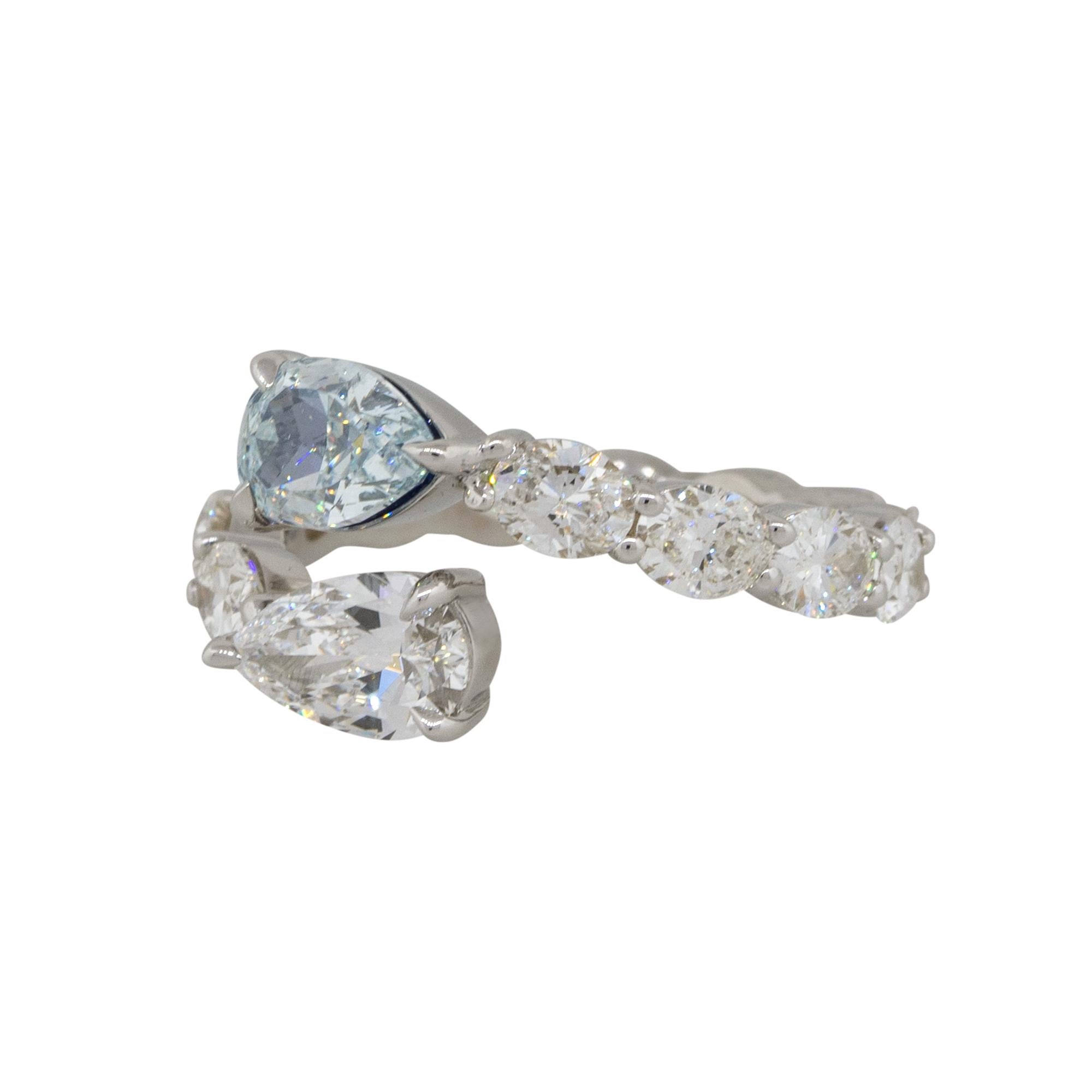 Material: 18k White Gold
Diamond details: 1.01ctw pear shape Diamond. Diamond is Fancy Blue in color and VS in clarity. GIA #7336510053
                             0.70ctw Pear shape Diamond. Diamond is D in color and VS1 in clarity. GIA #