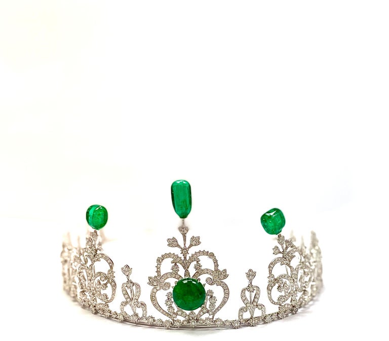 42.42 Carat GRS Certified Emerald Beads and White Diamond Gold Tiara/Necklace:

A very beautiful and unique tiara that also converts into a necklace, it features 4 stunning GRS certified natural emerald beads weighing a total of 42.42 carat,