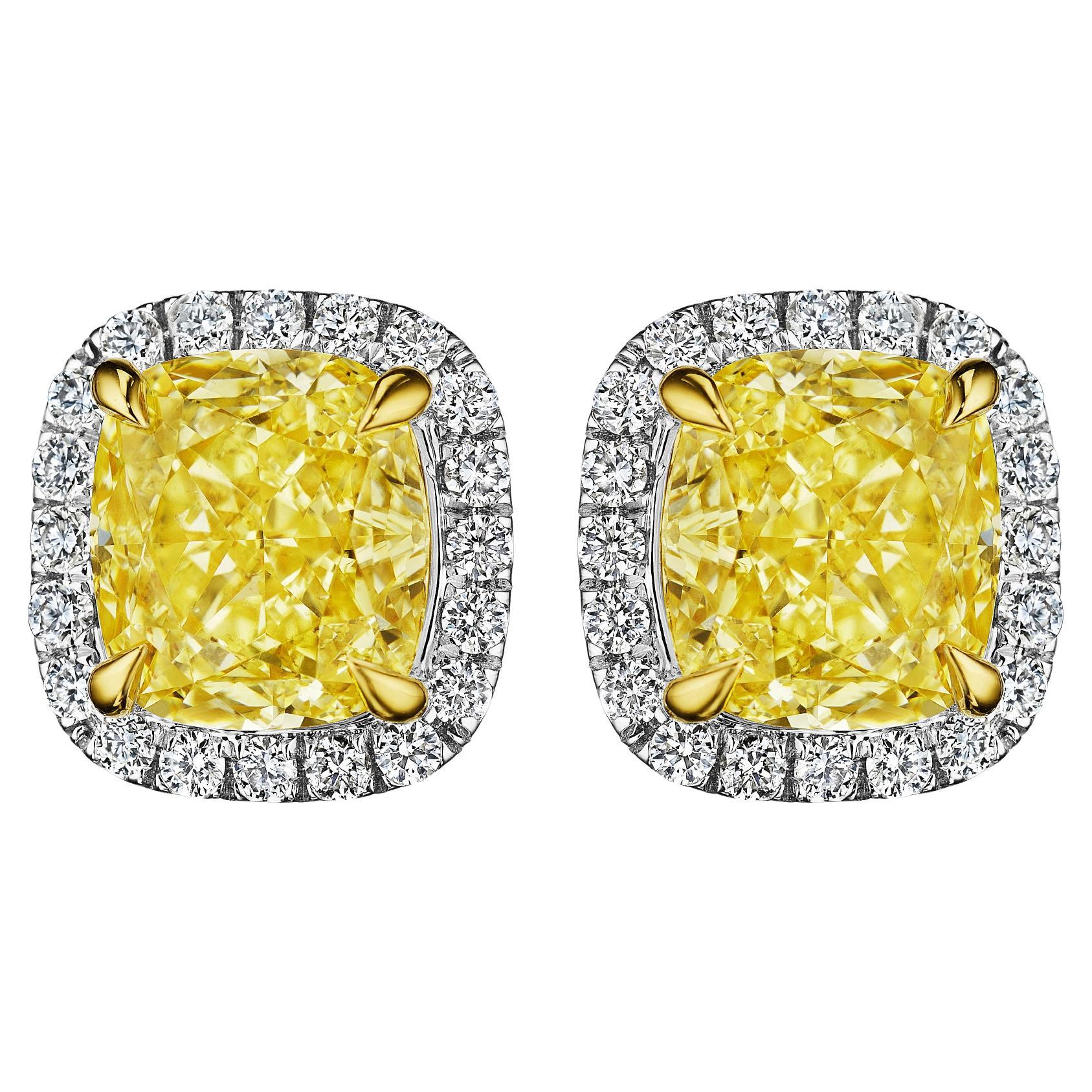 4.24ct GIA Certified Fancy Yellow Cushion & Round Diamond Earrings in 18KT Gold For Sale