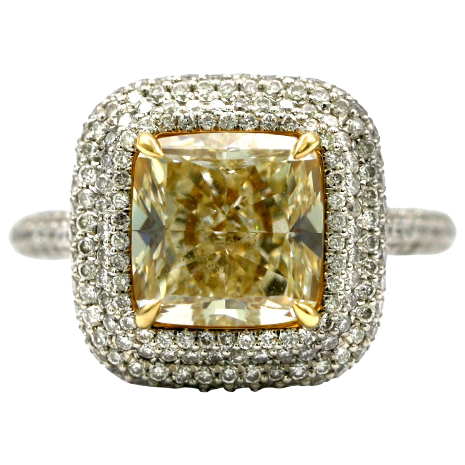 4.25 Carat EGL Fancy Light Yellow Cushion SI1 Diamond with Pave Platinum Ring For Sale