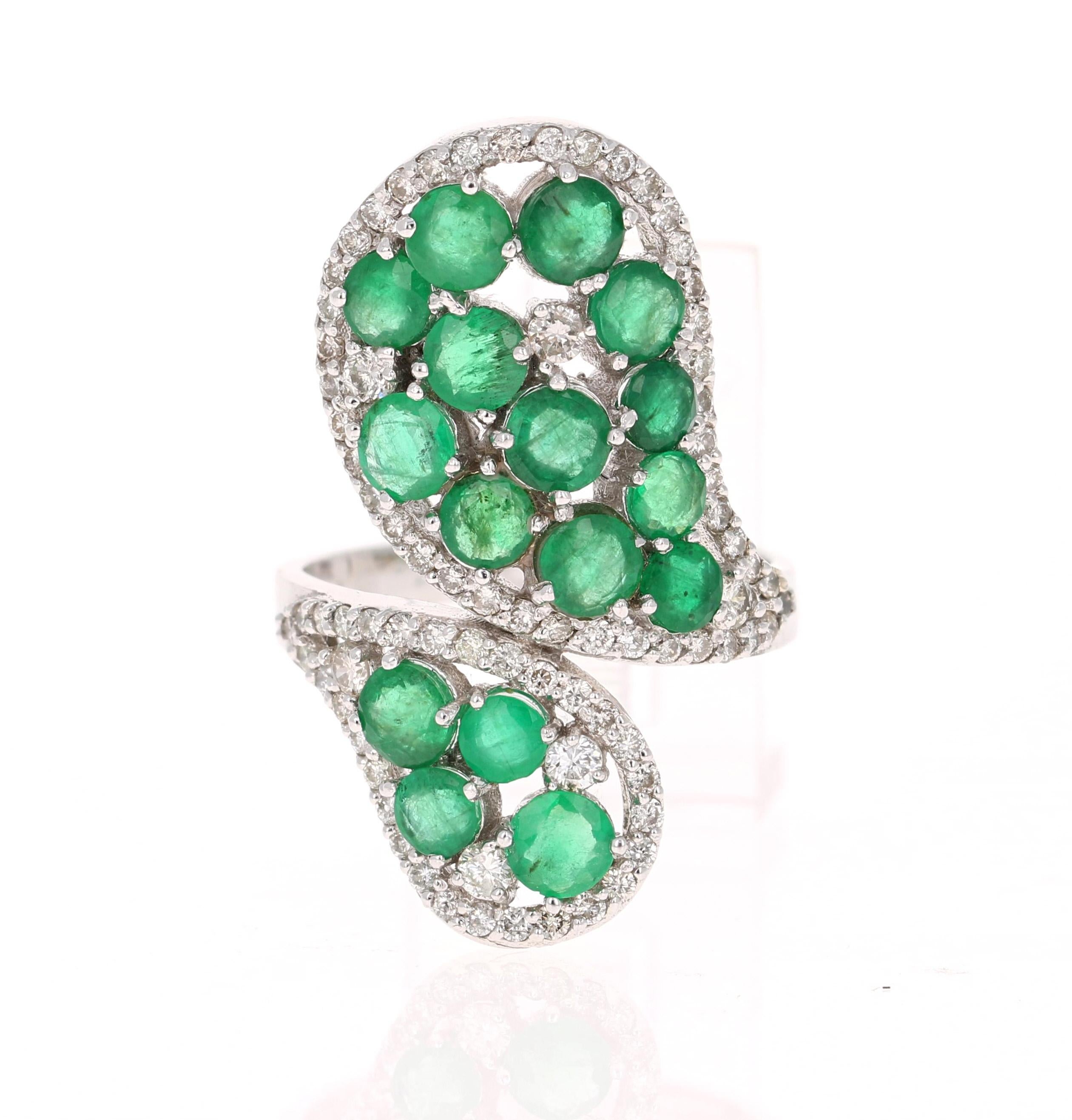 This Emerald ring is absolutely gorgeous. 

Natural Round Cut Emeralds weighing 3.31 Carats 
79 Round Cut Diamonds weighing 0.94 Carats
The total carat weight of the ring is 4.25 Carats

This ring is curated in 14 Karat White Gold and weighs