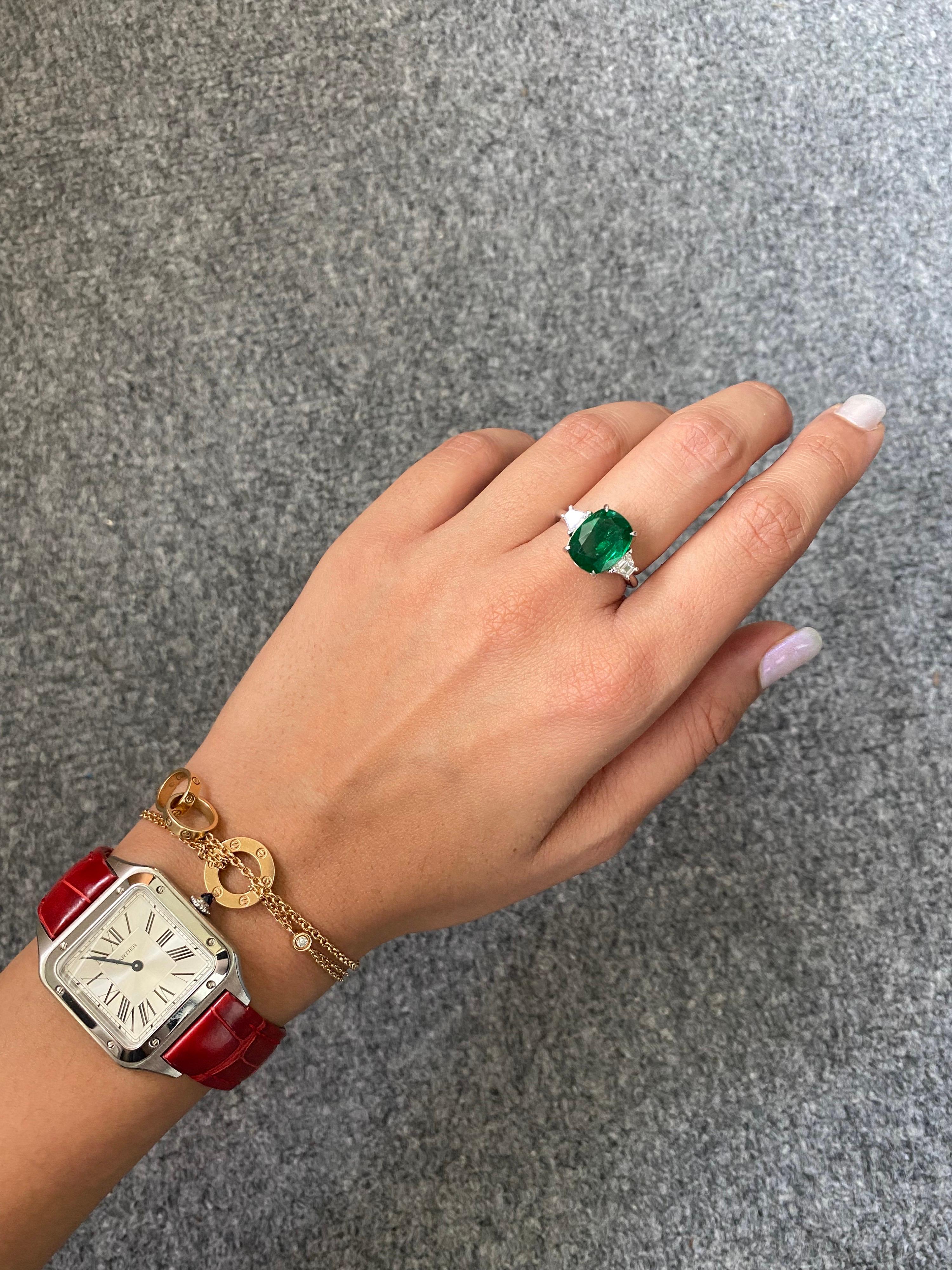 Modern 4.25 Carat Emerald and Diamond Three-Stone Engagement Ring