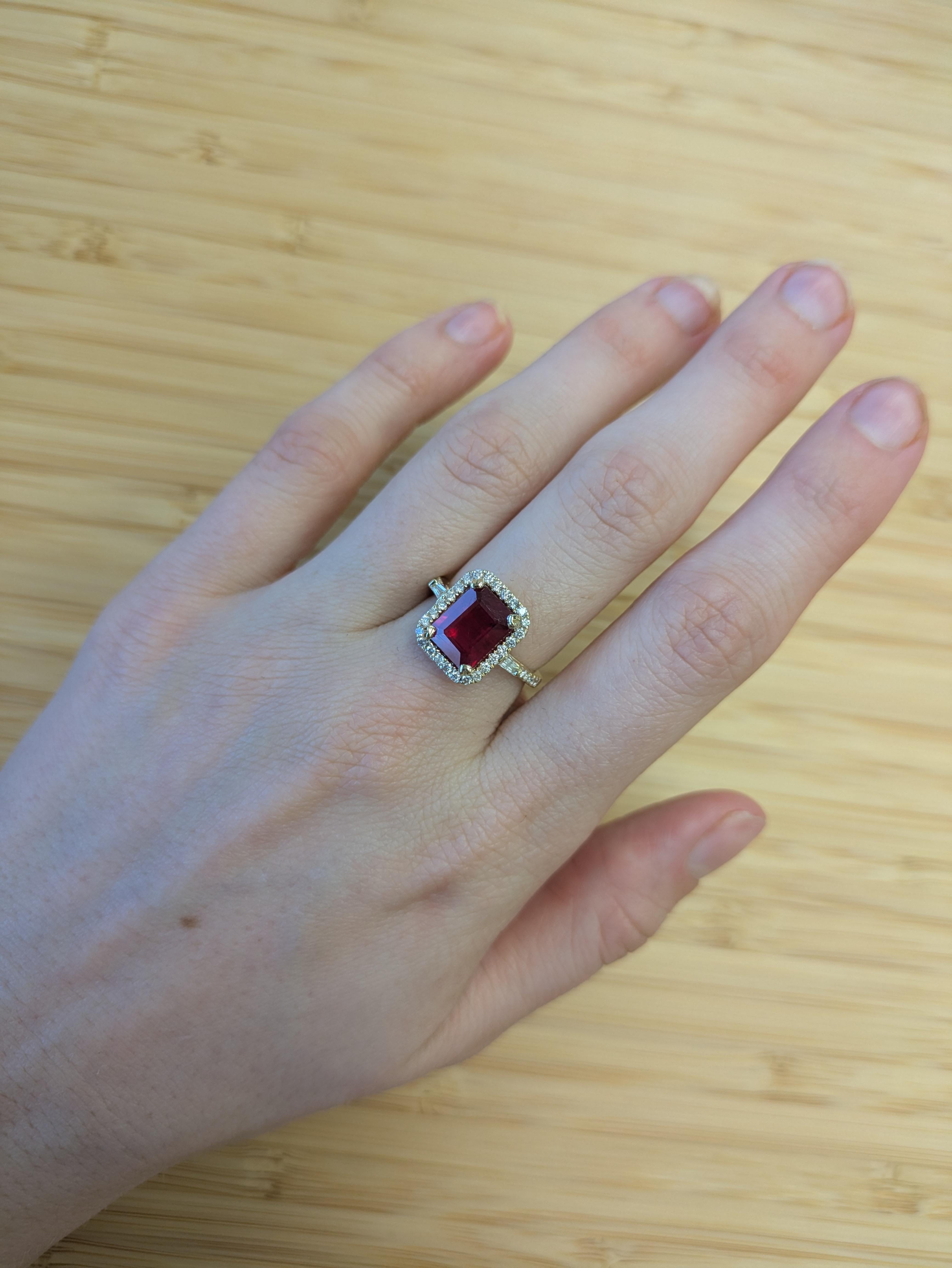 Radiating timeless beauty, this 4.25-carat Madagascar ruby shines at the heart of a sparkling earth-mined diamond halo. Set in solid 14K yellow gold with additional diamond accents, it’s a bold, romantic statement of elegance.

**We offer
