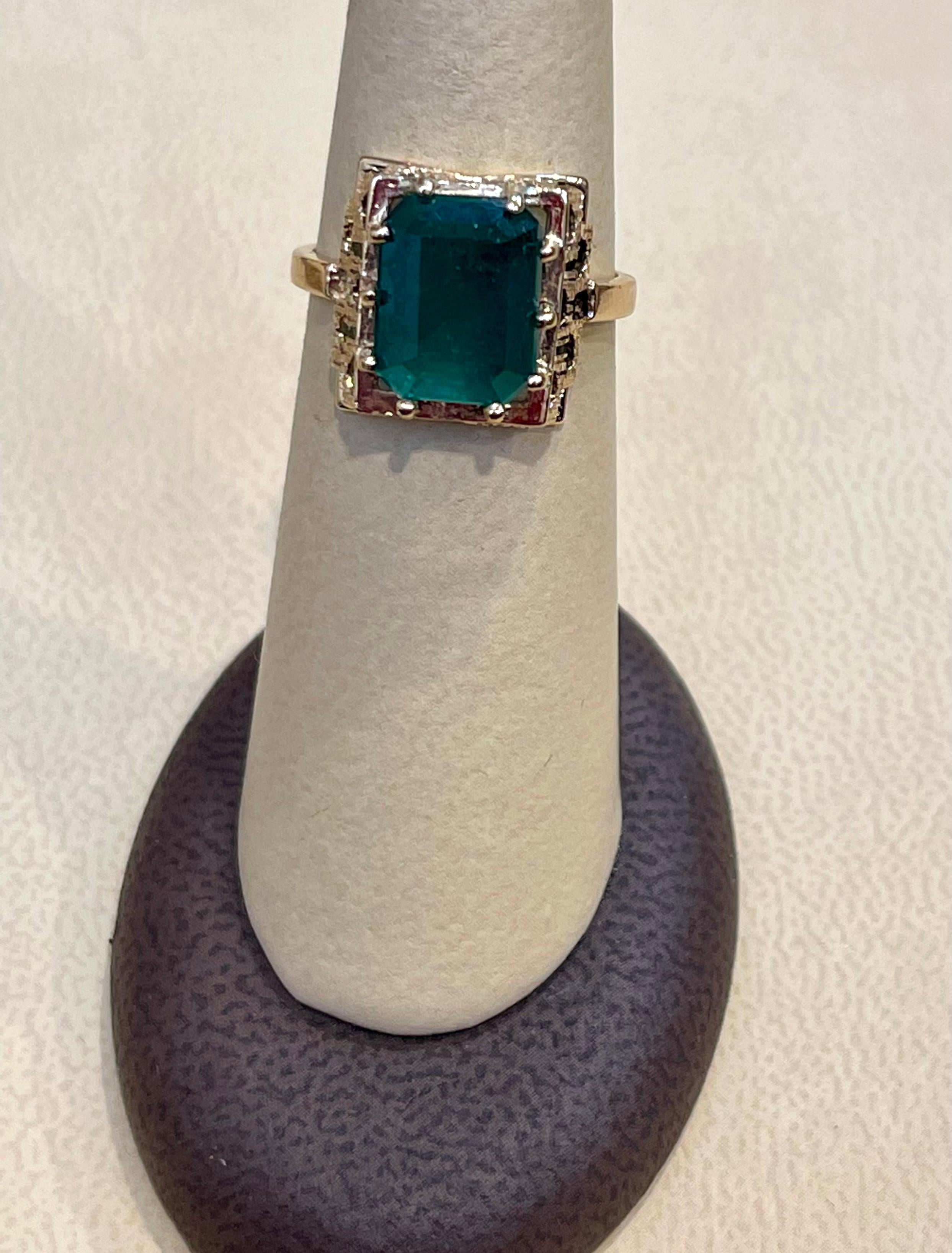 4.25 Carat Natural Emerald Cut Emerald Ring 14 Karat Yellow Gold For Sale 6