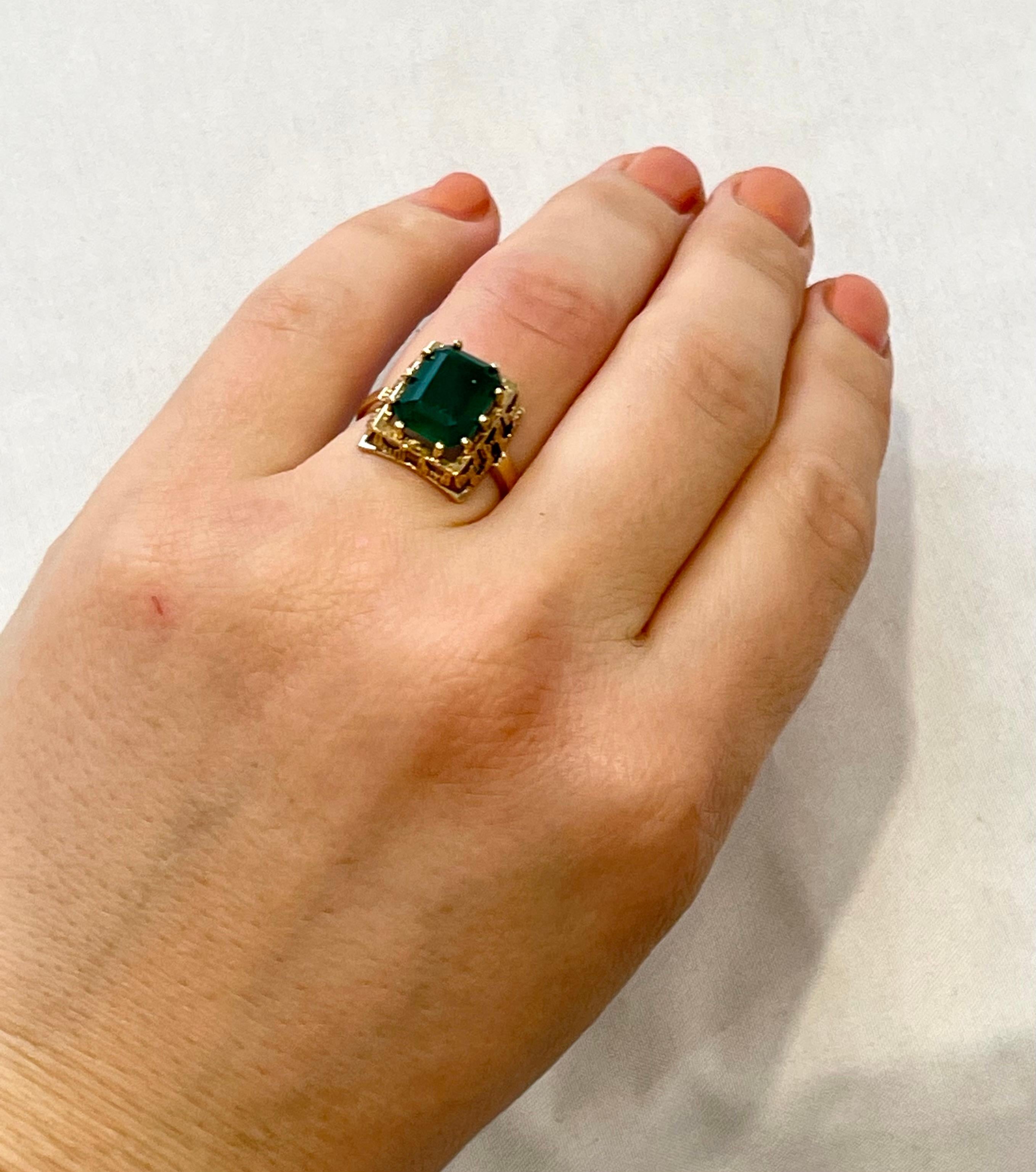 Women's 4.25 Carat Natural Emerald Cut Emerald Ring 14 Karat Yellow Gold For Sale