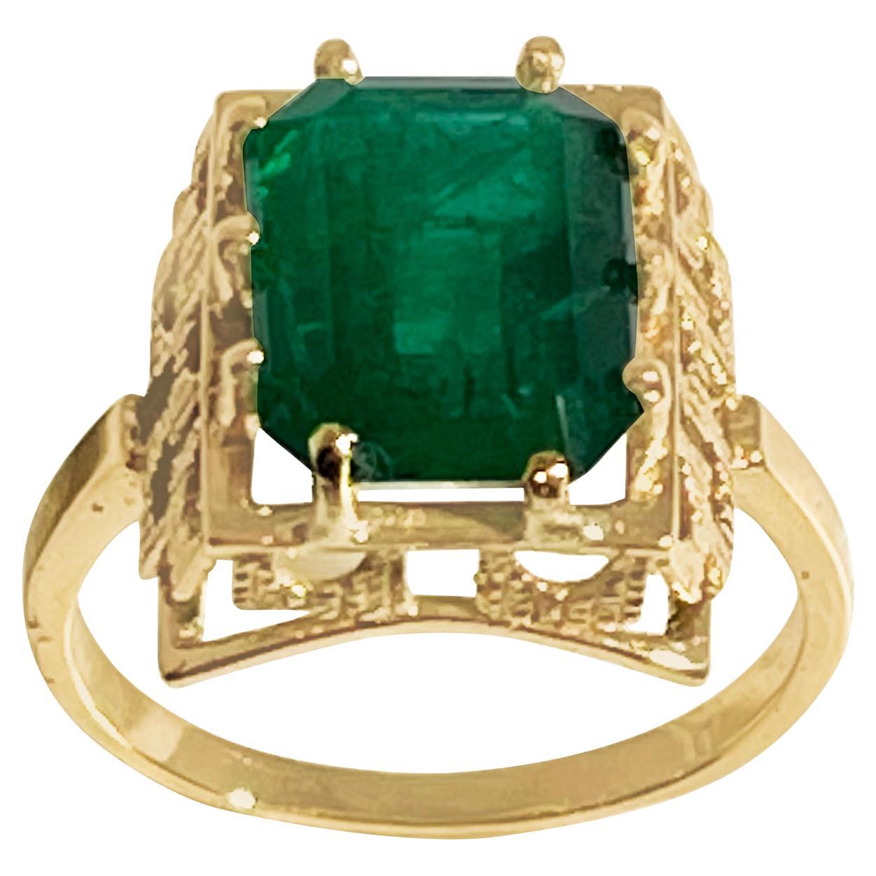 4.25 Carat Natural Emerald Cut Emerald Ring 14 Karat Yellow Gold For Sale
