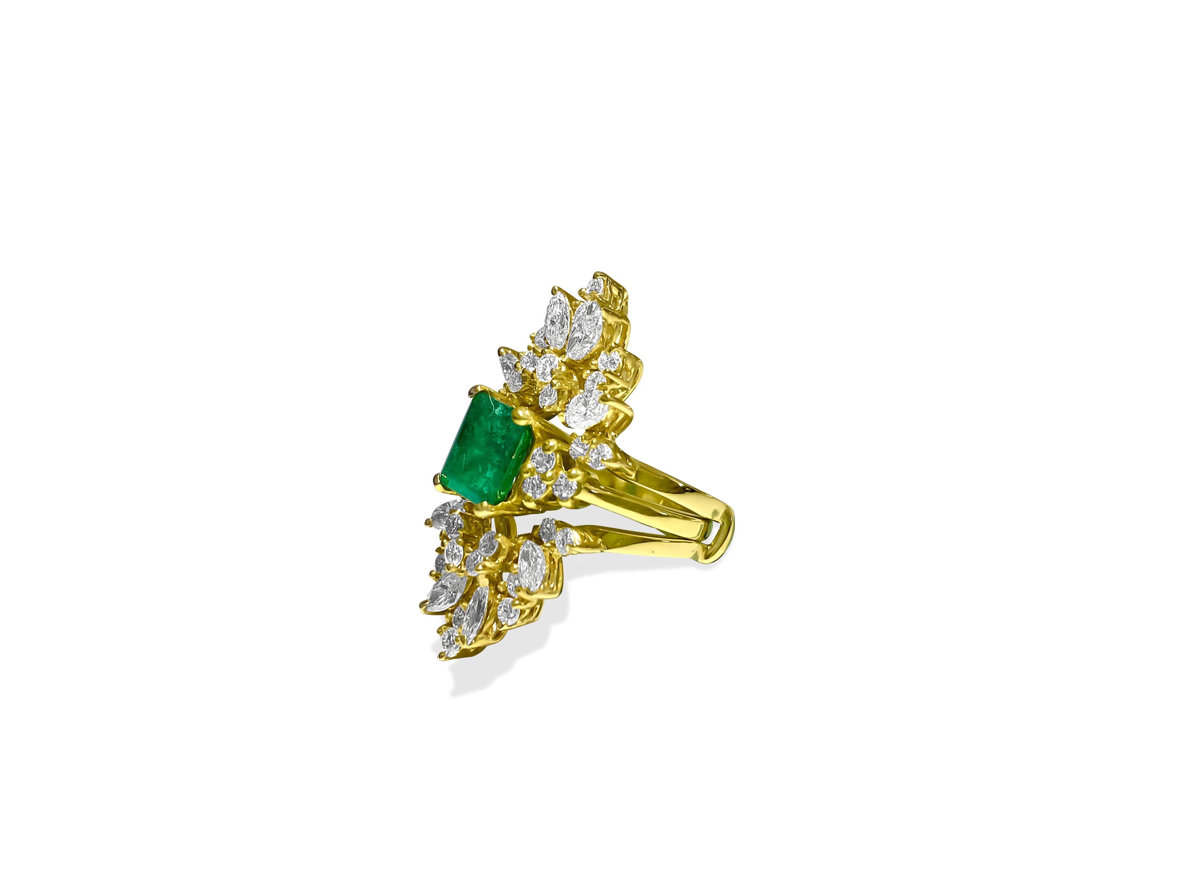 Metal: 14K Yellow gold. 
2.25 carat diamonds. VS clarity and F color. Round brilliant cut and marquise cut. 100% natural earth mined diamonds. 
2.00 carat natural Emerald. 100% natural earth mined emerald. 
Emerald cut emerald set in prongs.