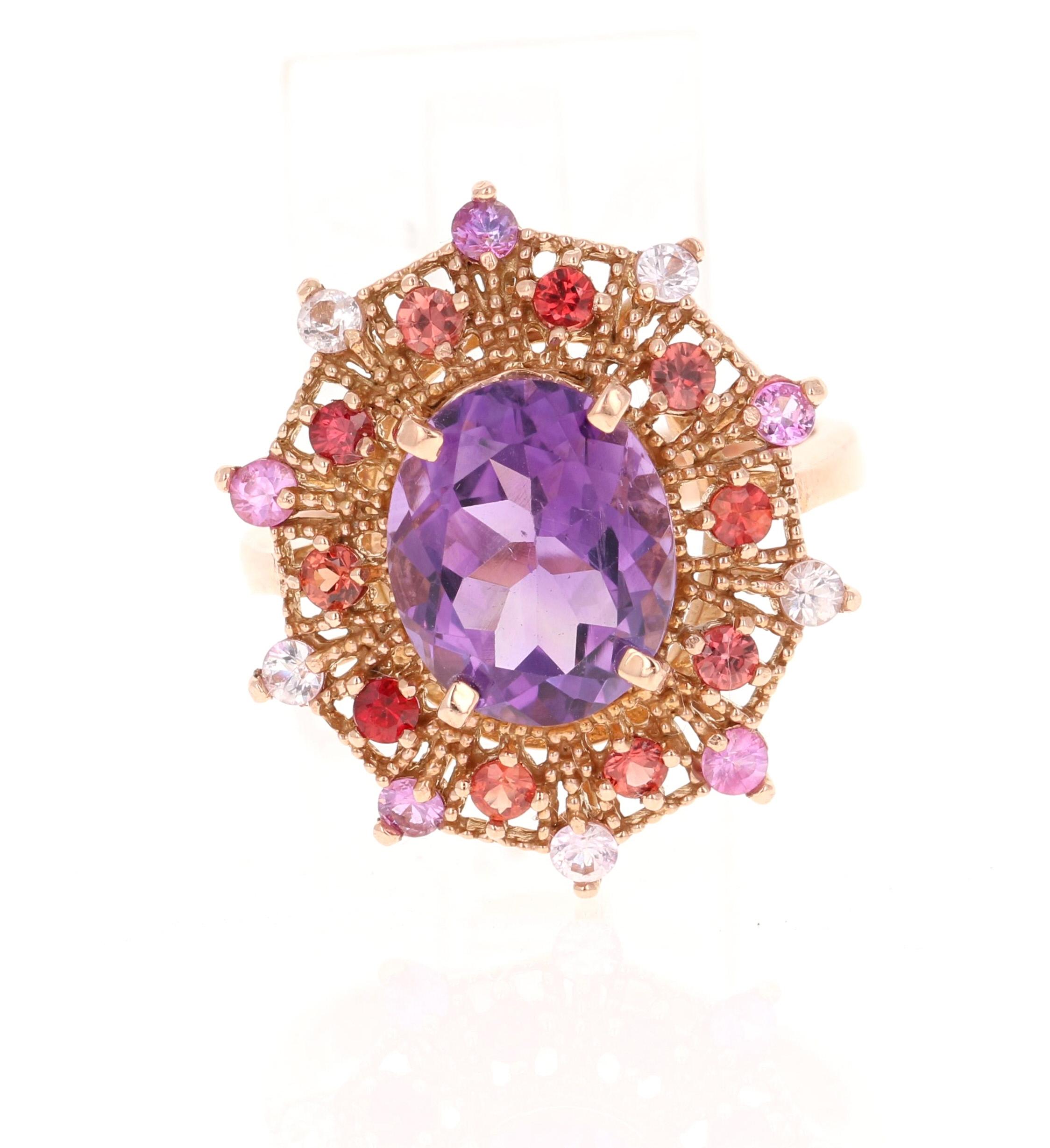 4.25 Carat Oval Cut Amethyst Sapphire Rose Gold Cocktail Ring

This beautiful vintage inspired setting with a modern colorful theme has an Oval Cut Amethyst weighing 3.33 carats and is surrounded by 20 Round Cut Multi-Colored Sapphires that weigh