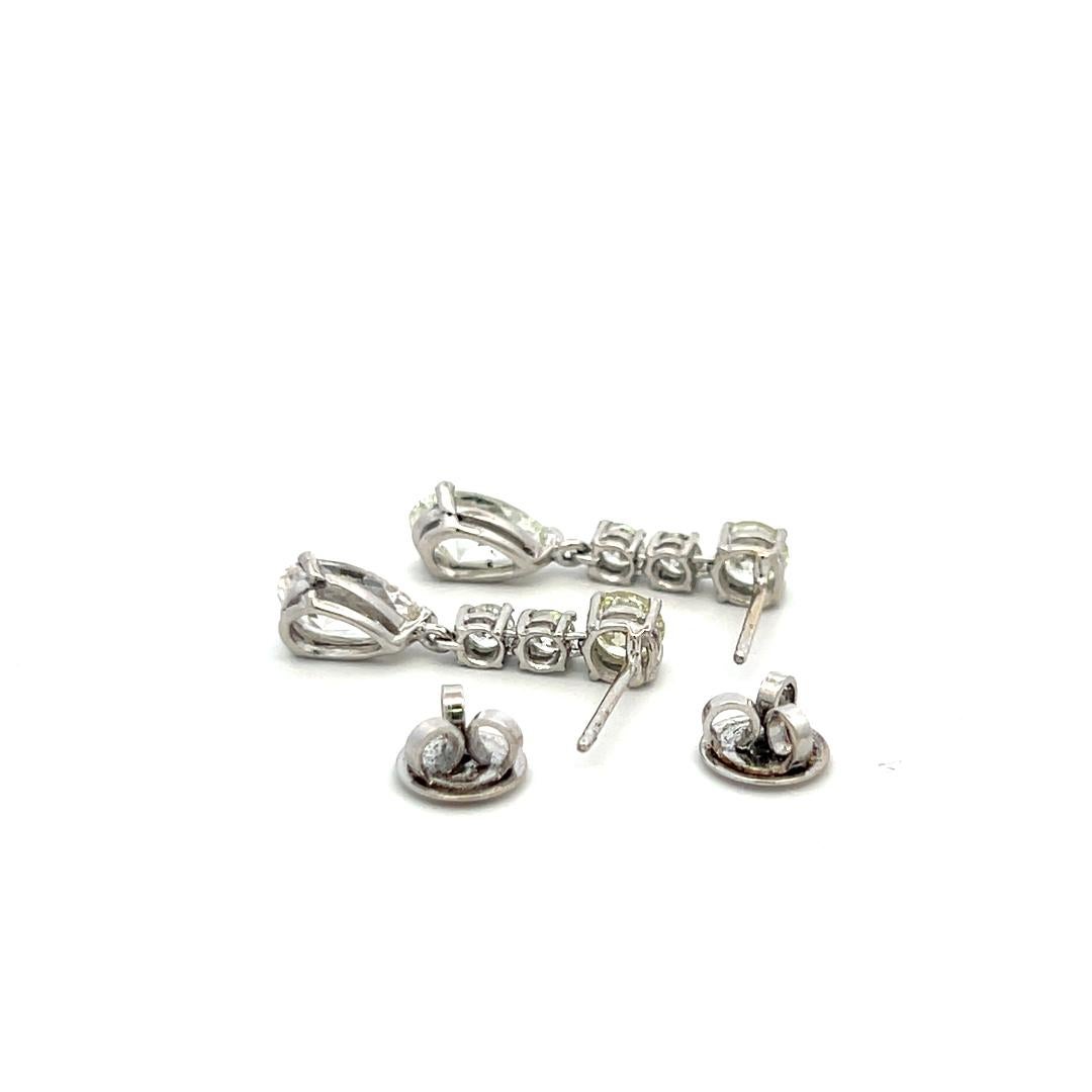 Orecchini a goccia in platino con pera e diamante tondo brillante J SI da 4,25 carati in vendita 14