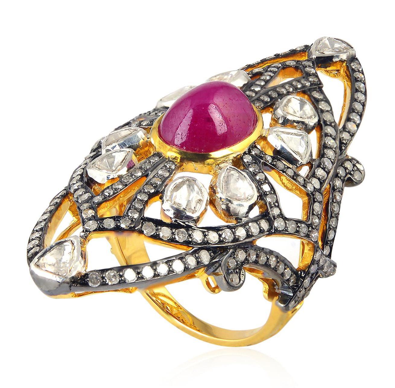 This ring has been meticulously crafted from 18-karat gold & sterling silver with blackened finish. Handcrafted in 4.25 carats ruby & illuminated with 2.48 carats diamonds. 

The ring is a size 7 and may be resized to larger or smaller upon request.
