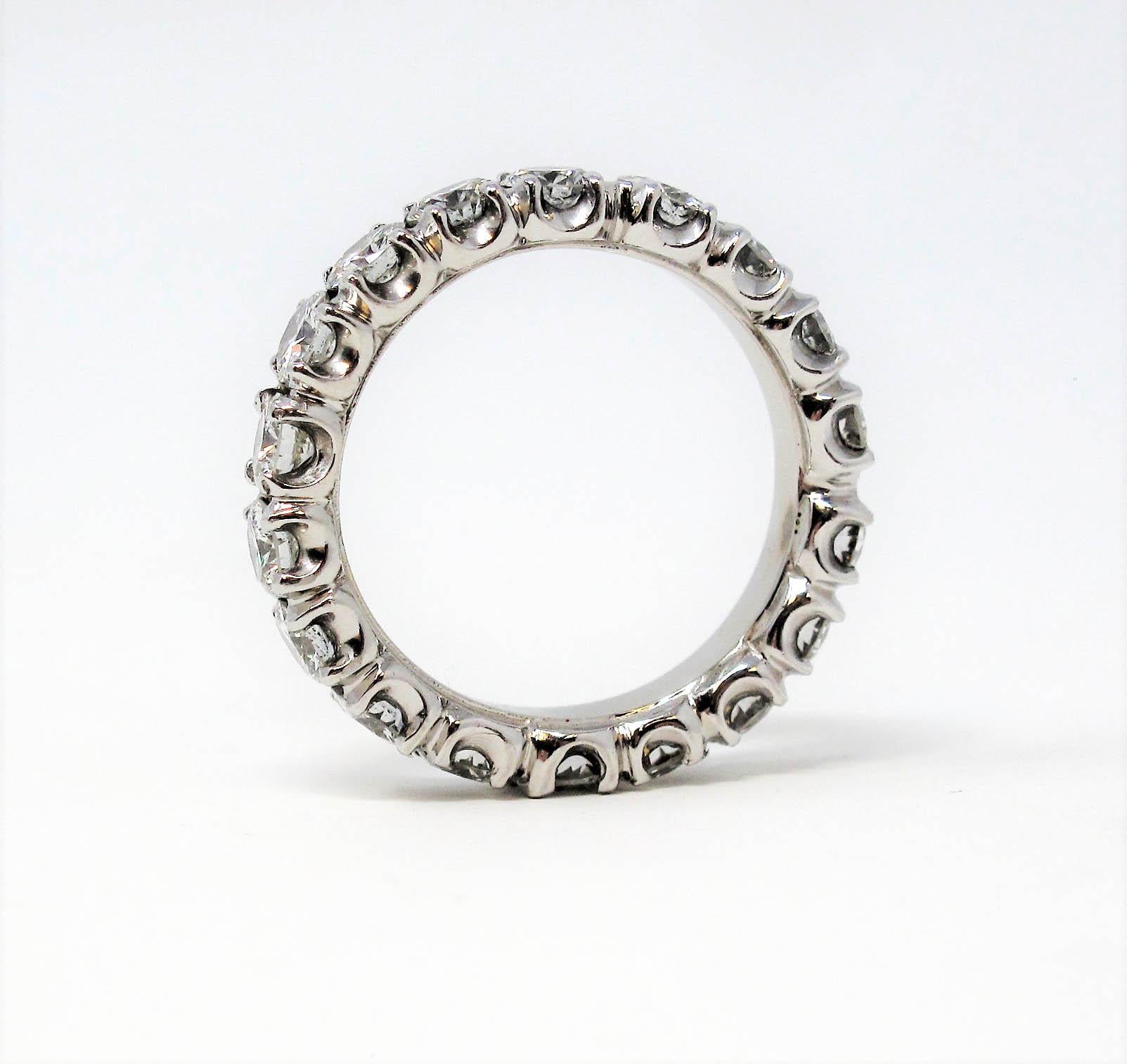 Round Cut 4.25 Carat Total Round Brilliant Diamond Eternity Band Ring in Platinum Size 9 For Sale