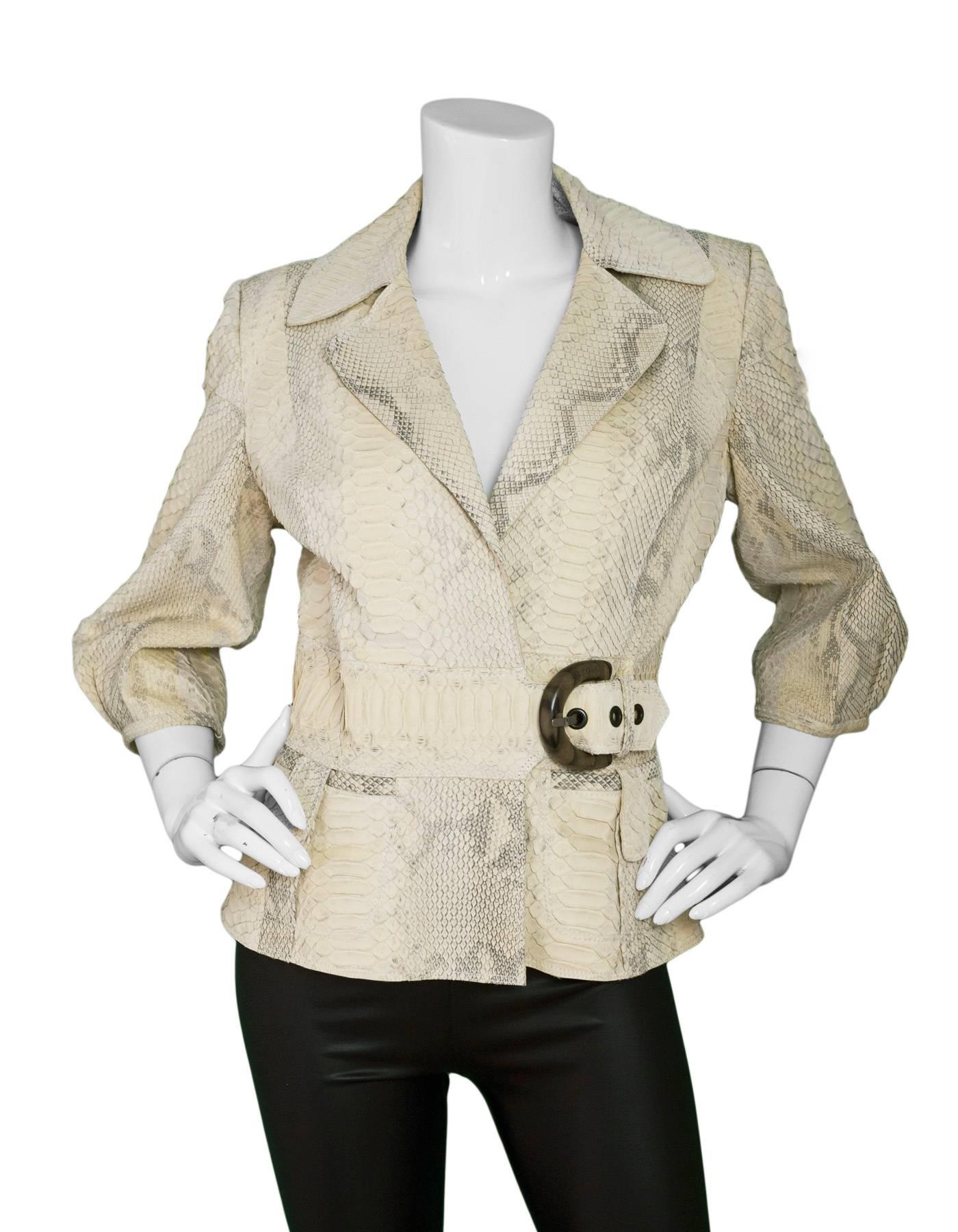 Jitrois Cream Snakeskin Jacket Sz IT44

Color: Cream
Composition: Not listed
Lining: Cream textile
Closure/Opening: Front buckle closure at hip
Overall Condition: Very good pre-owned condition with the exception of some soiling at interior lining at