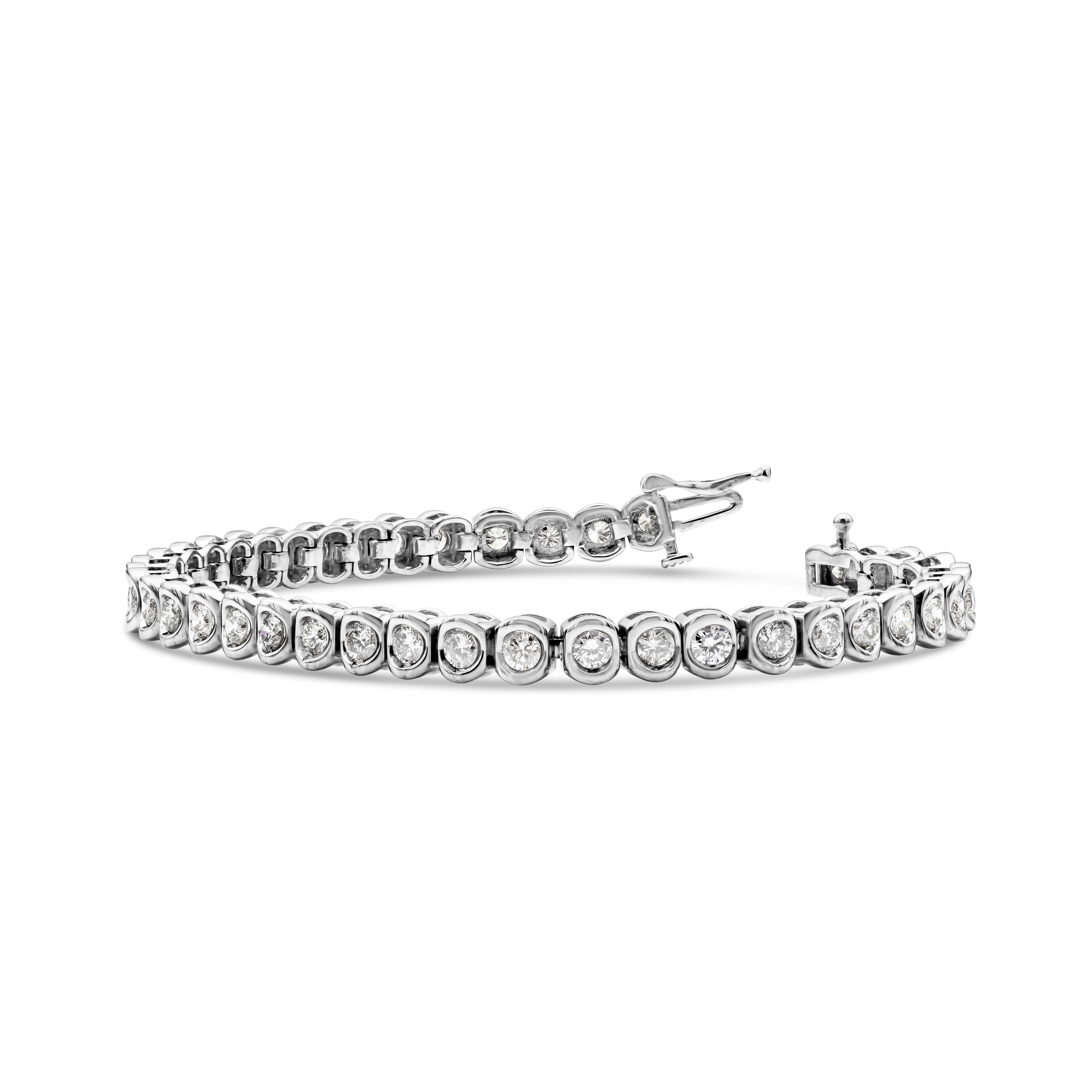 This beautiful bracelet showcases a row of 41 round brilliant diamonds mounted in 14K White Gold bezel setting. Diamond weighs 4.25 carats total, F-G color and S12-I1 in clarity.
