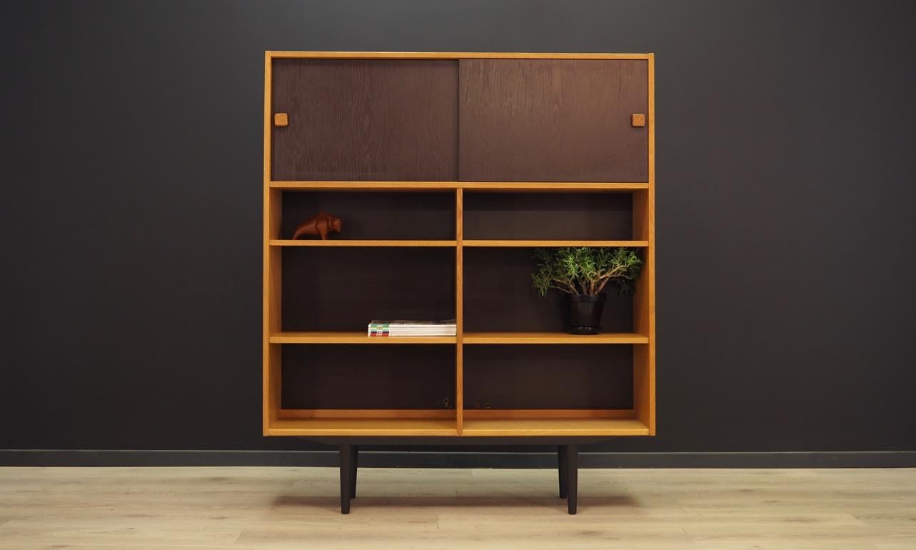 Exceptional bookcase / library from the 1960s-1970s, Danish design, Minimalist form. Manufactured by Domino Mobler. Furniture finished with ash veneer, doors in black. Maintained in good condition (minor bruises and scratches) - directly for
